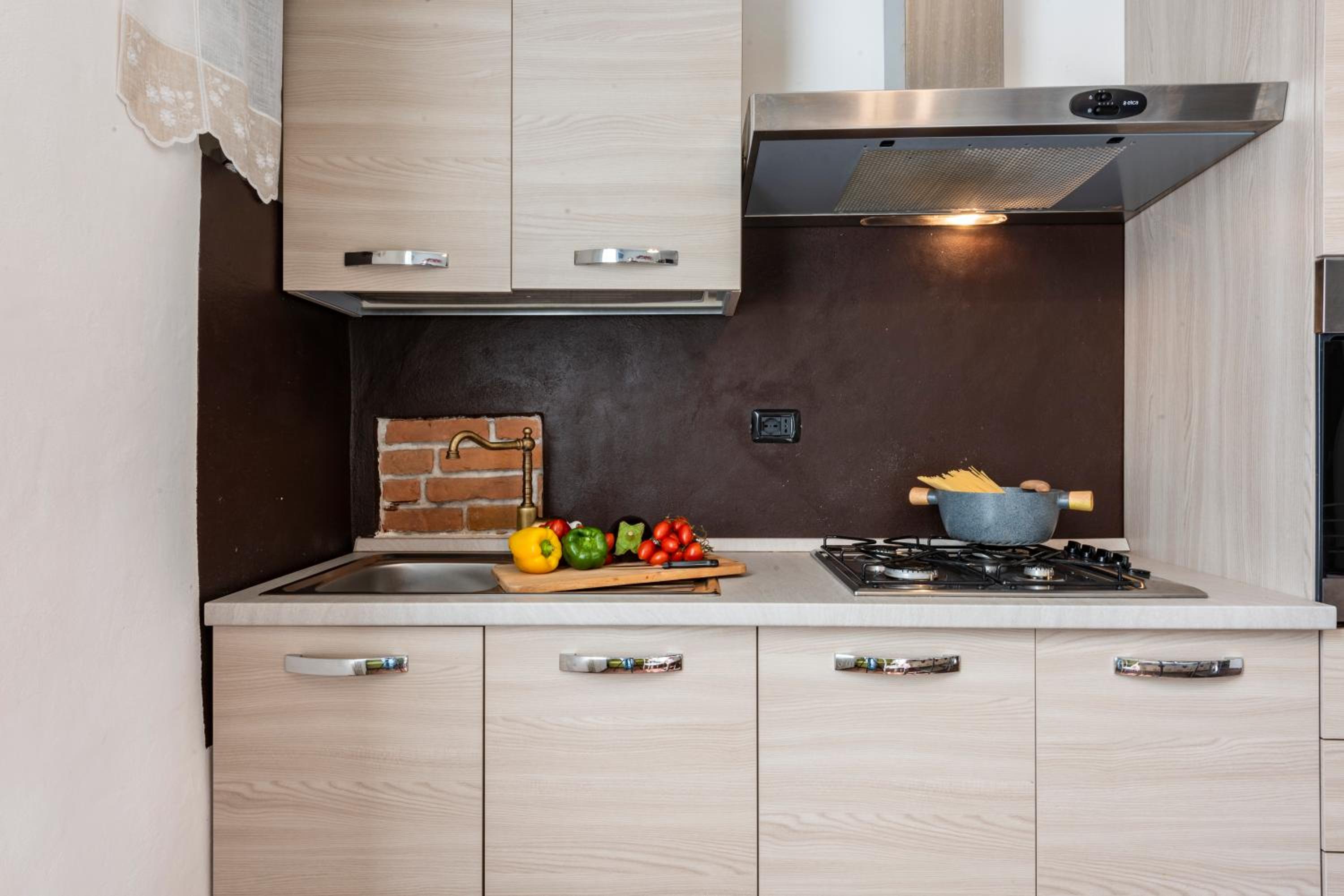 Conce Apartment en Pisa — kitchen