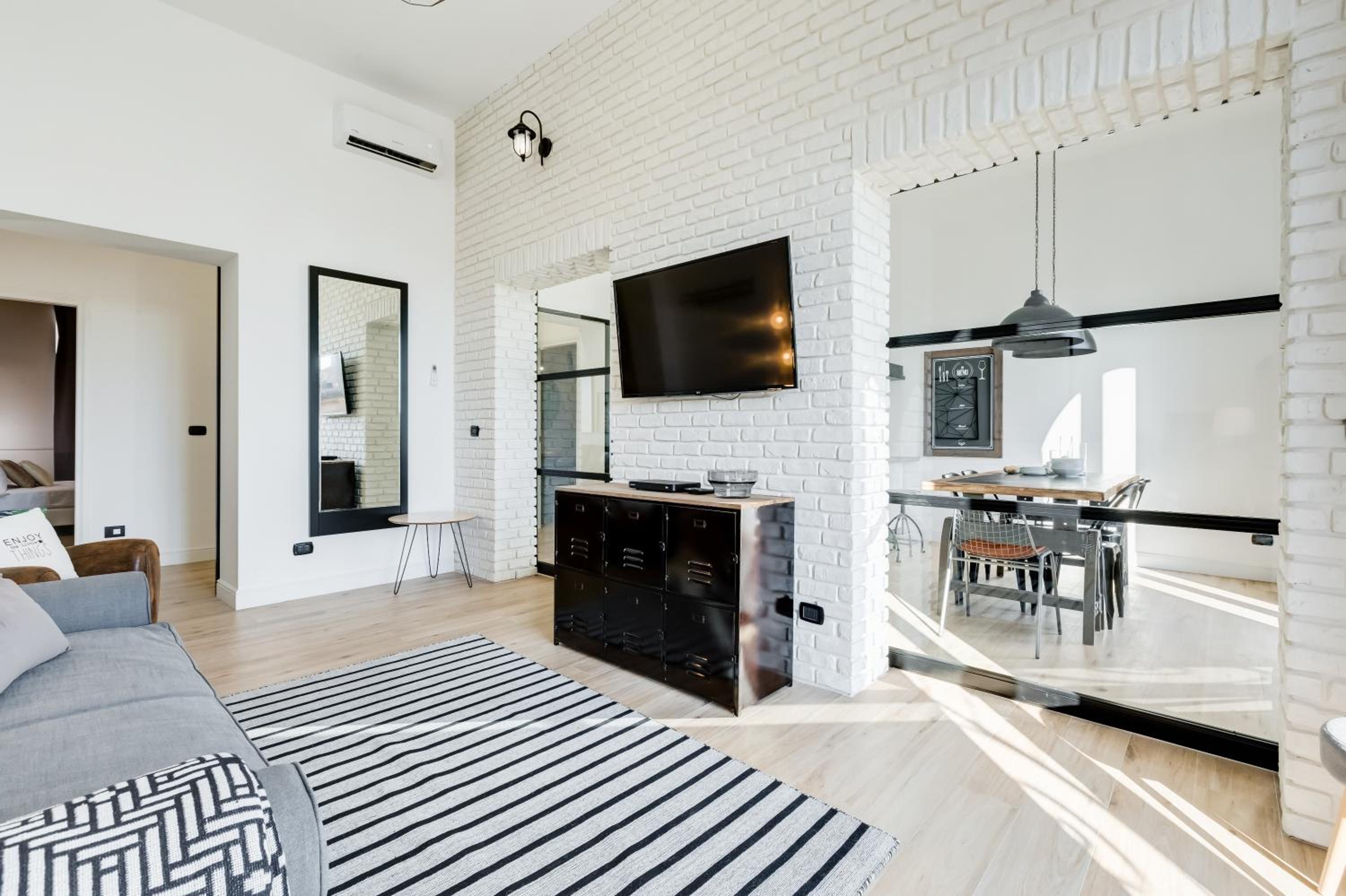 BMGA l Glam Industrial 3-Bed Apartment in Termini
