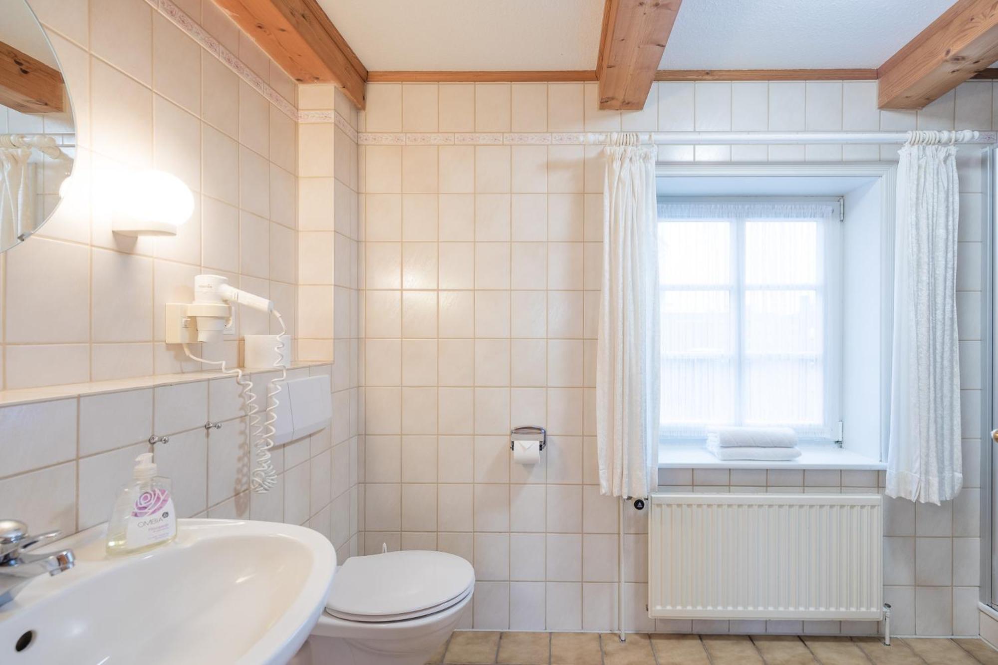 Direkt am Deich - Ferienwohnung Sylt im Gästehaus Am Badedeich