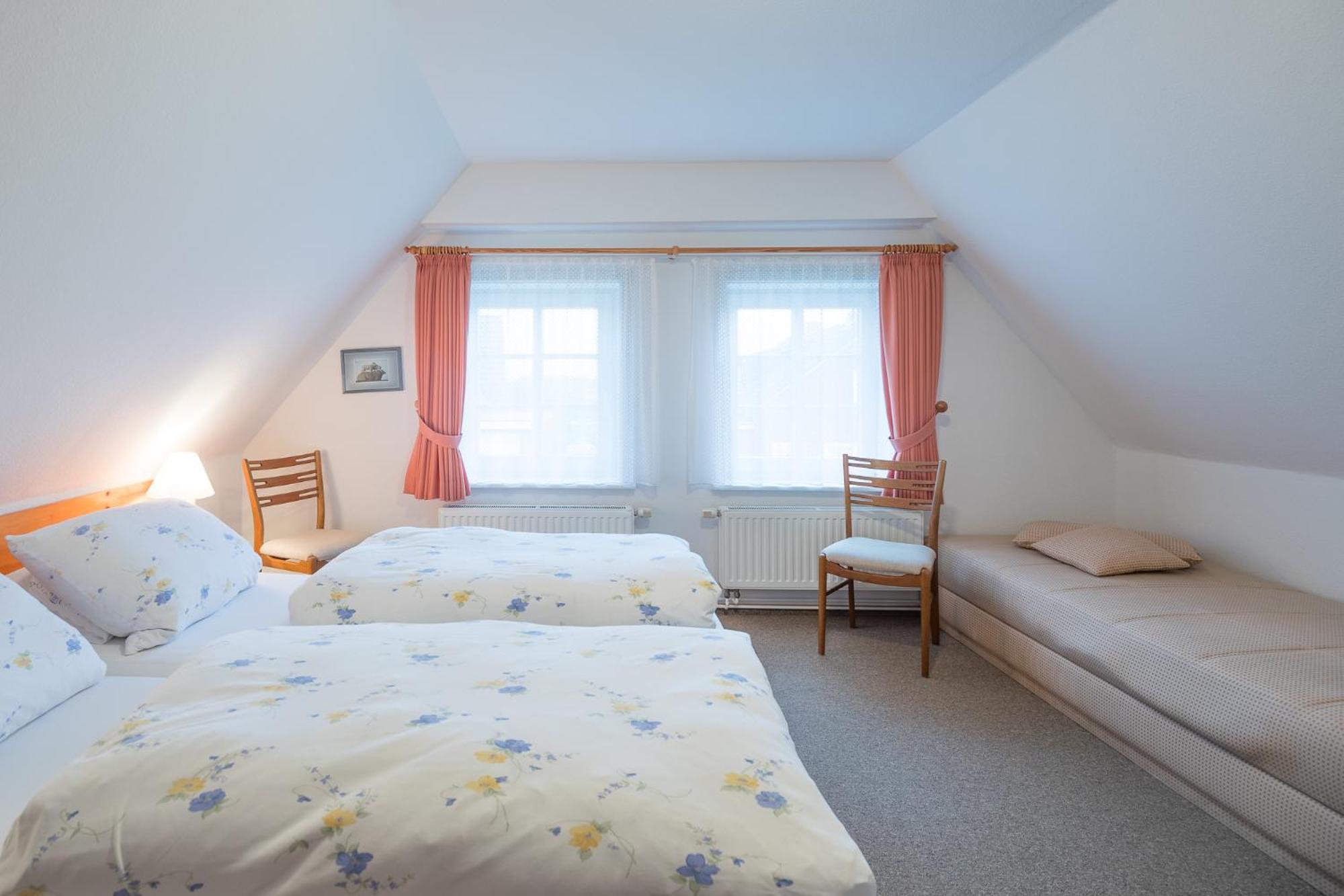 Direkt am Deich - Ferienwohnung Amrum im Gästehaus Am Badedeich