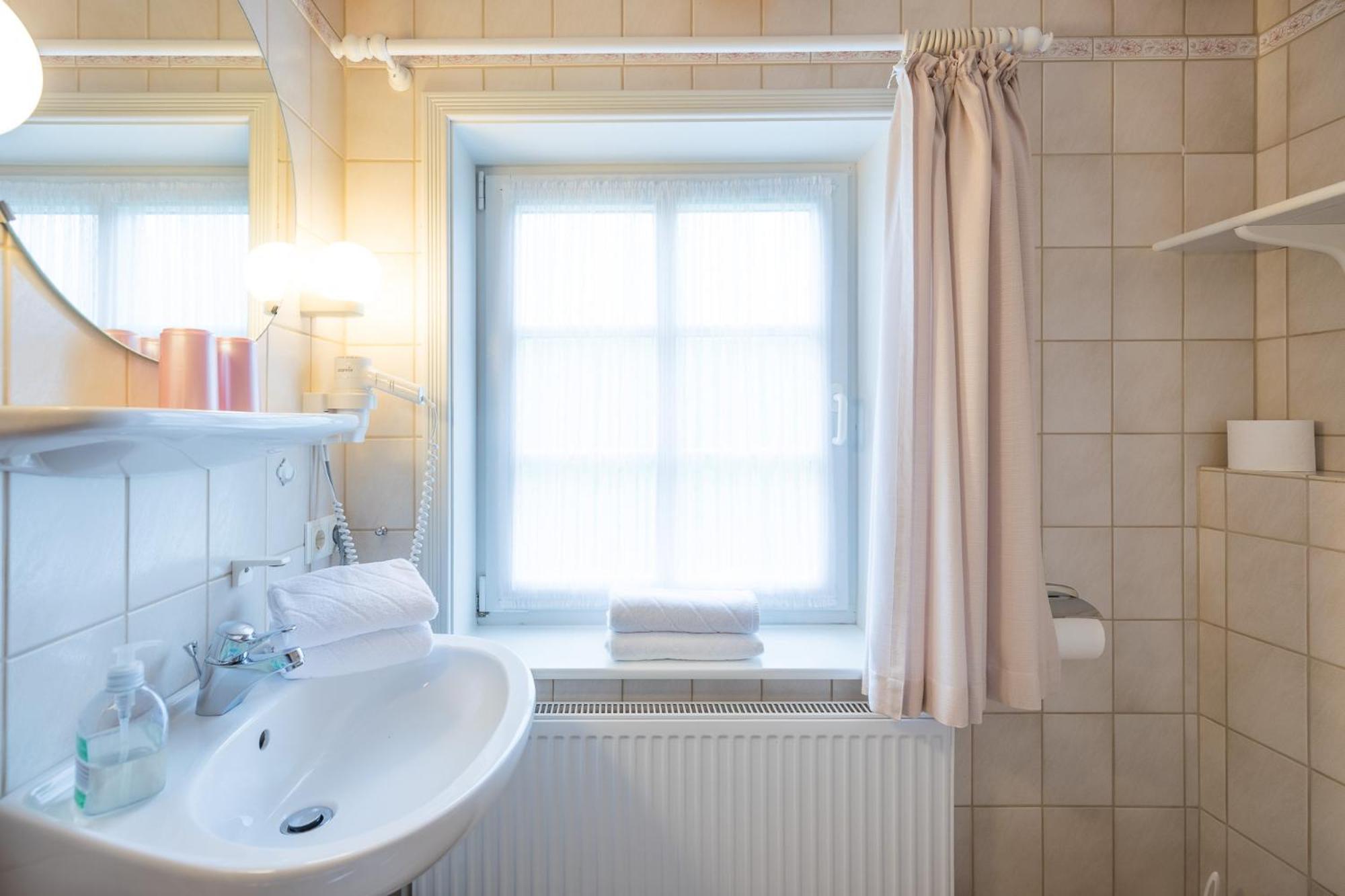 Direkt am Deich - Ferienwohnung Föhr im Gästehaus Am Badedeich