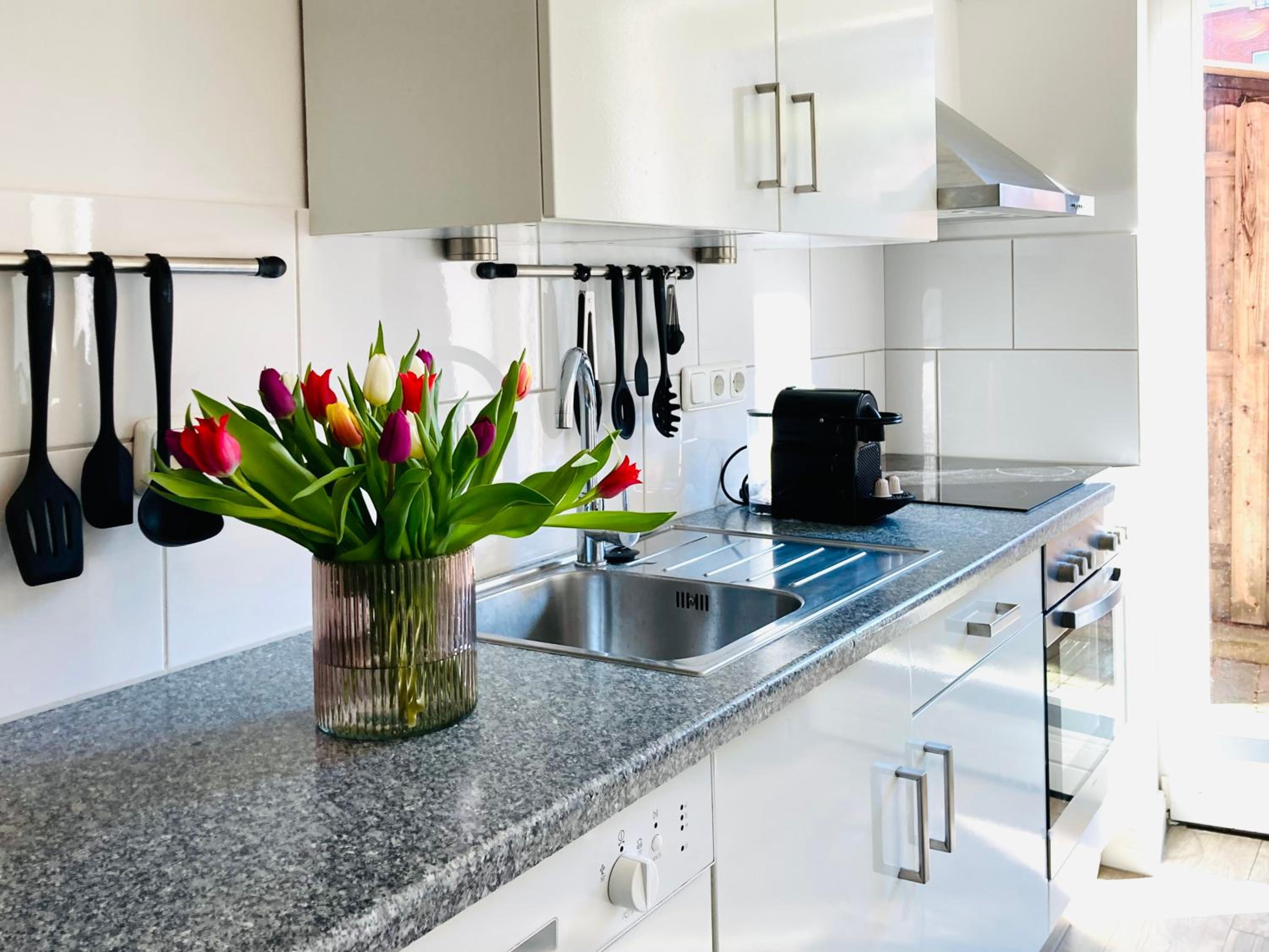 Die Stader Ferienwohnung mit Terrasse en Stade — kitchen