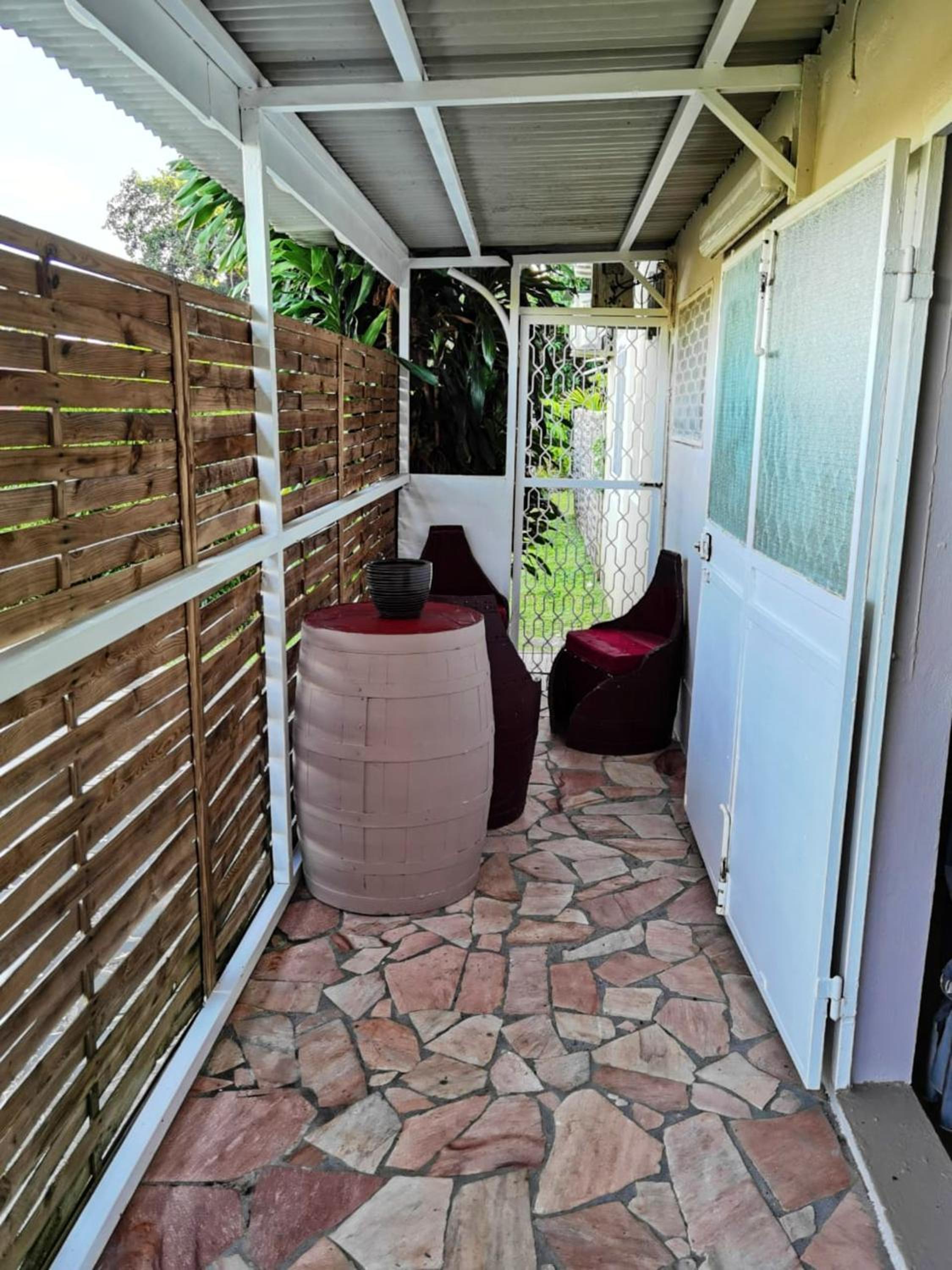 Appartement moderne au Lamentin avec jardin clos et parking