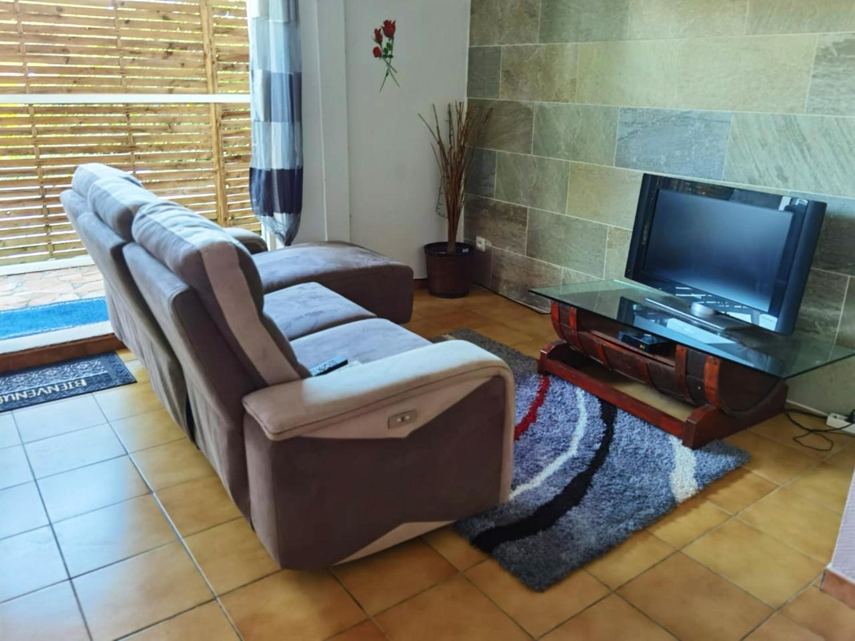 Appartement moderne au Lamentin avec jardin clos et parking