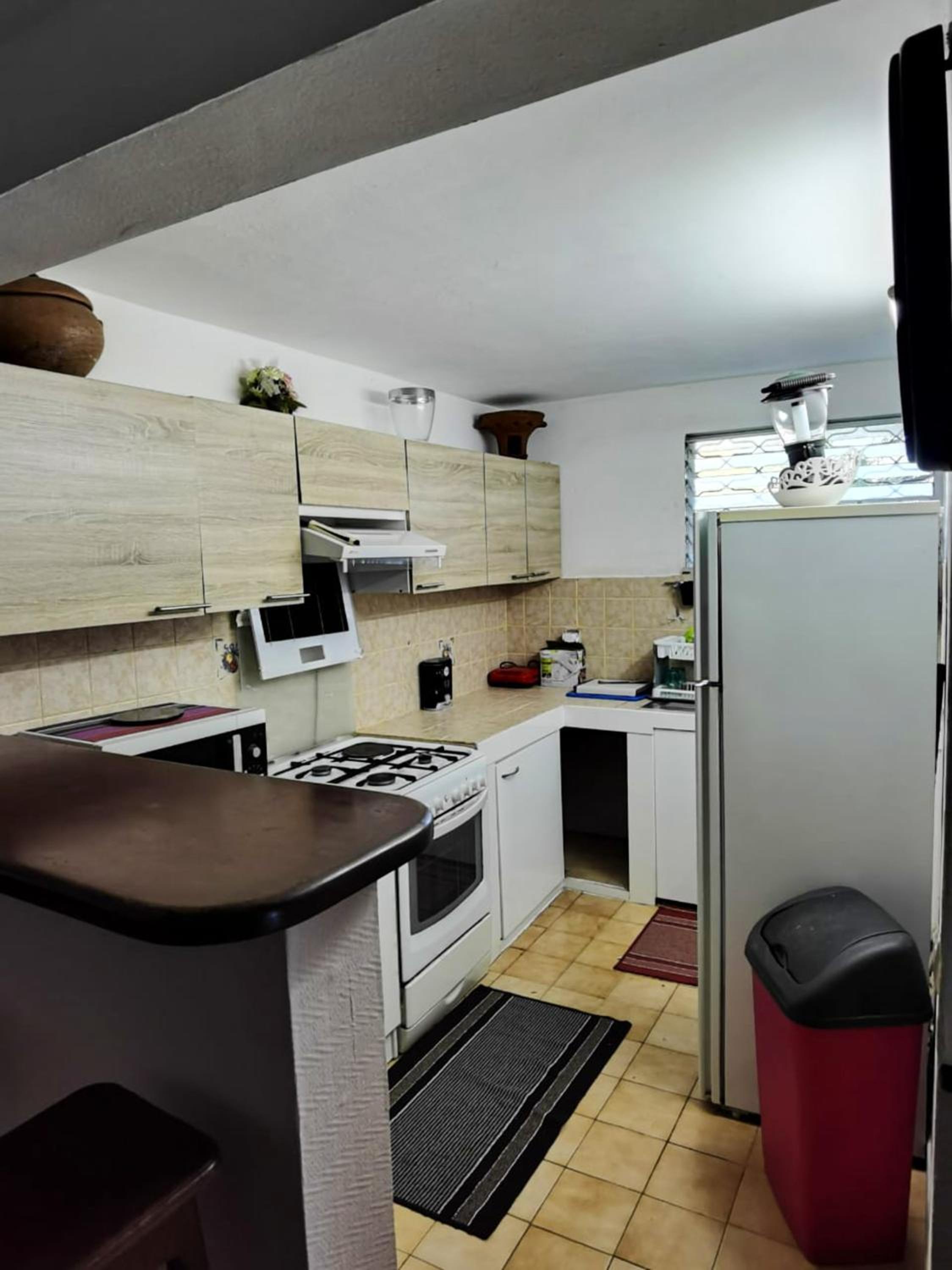 Appartement moderne au Lamentin avec jardin clos et parking