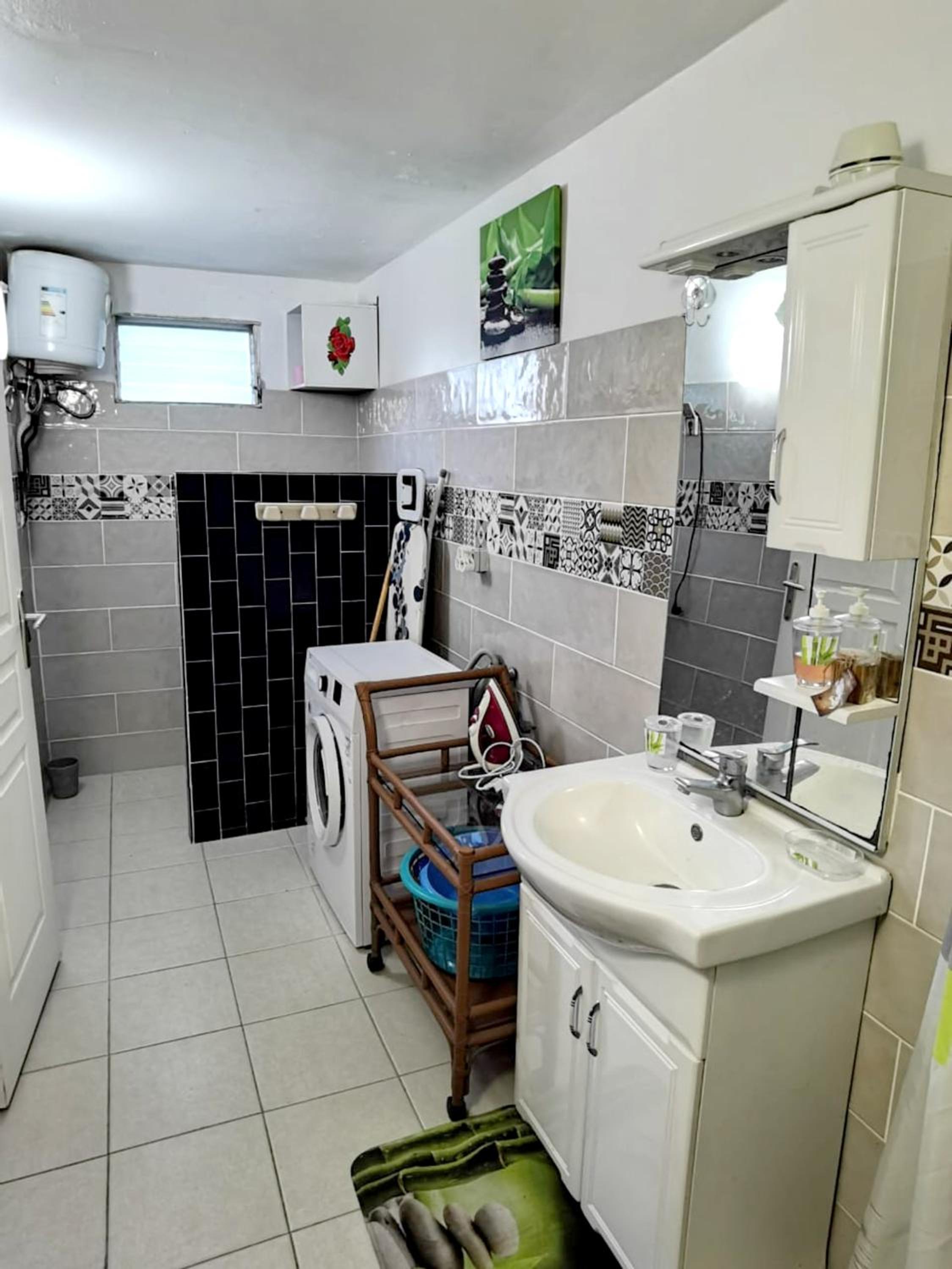 Appartement moderne au Lamentin avec jardin clos et parking