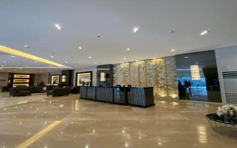 Cozy 1BR with balcony at Fame Residences view 2