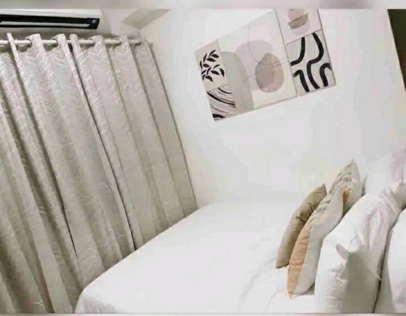 Cozy 1BR with balcony at Fame Residences view 5