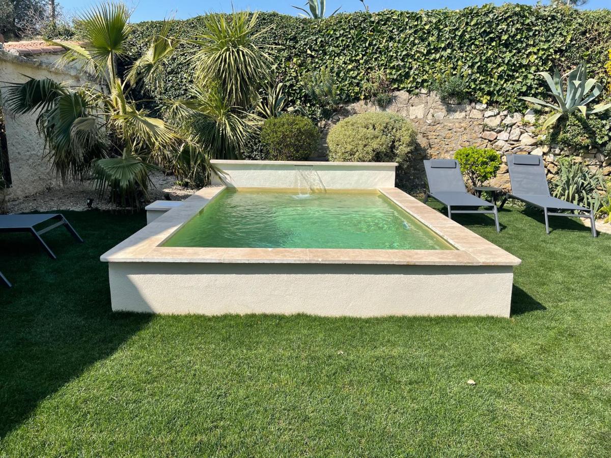 un petit coin de paradis avec piscine et parking view 2