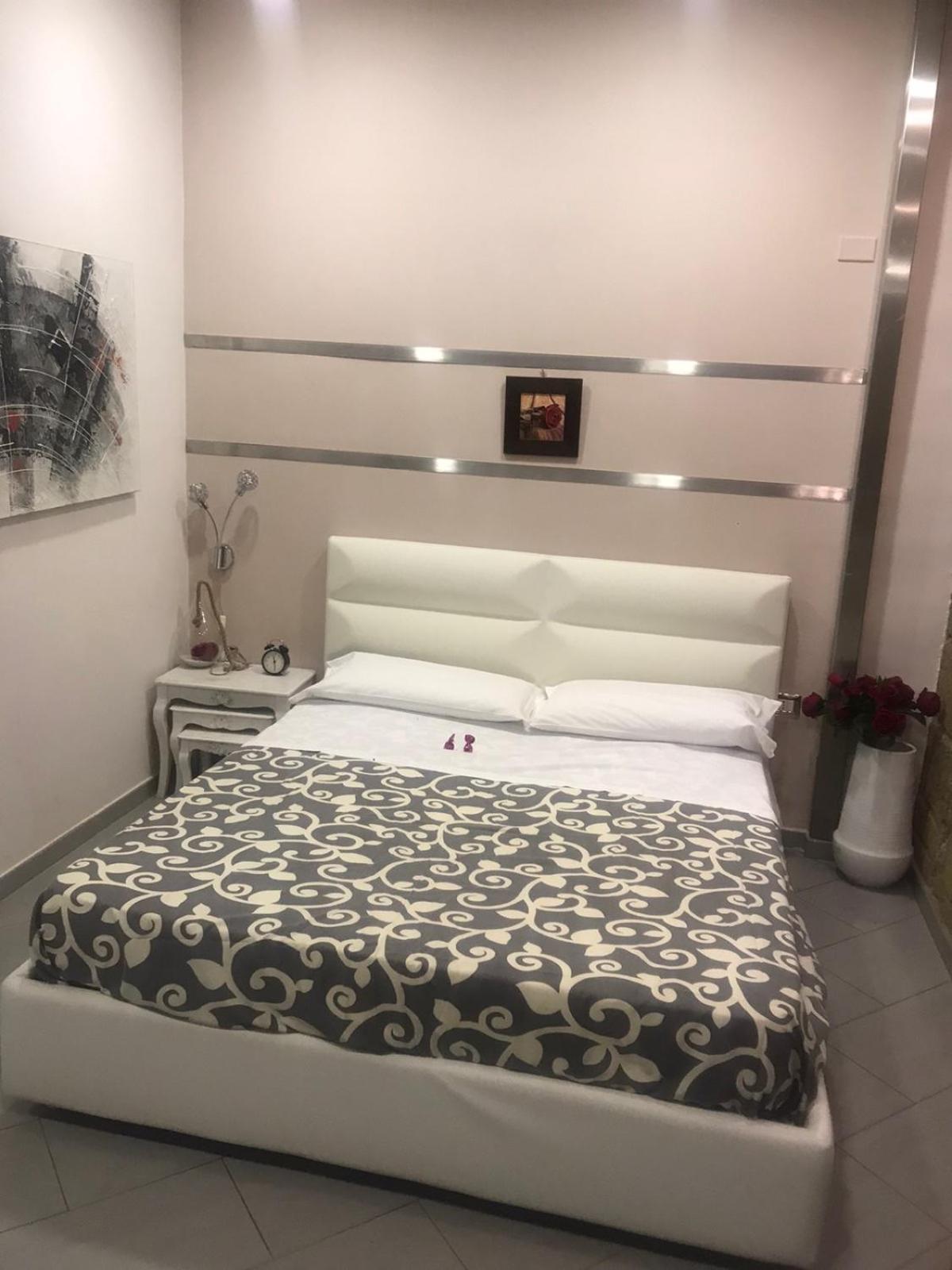 La Massaria B&B affittacamere riservatissimo en Salerno — bedroom