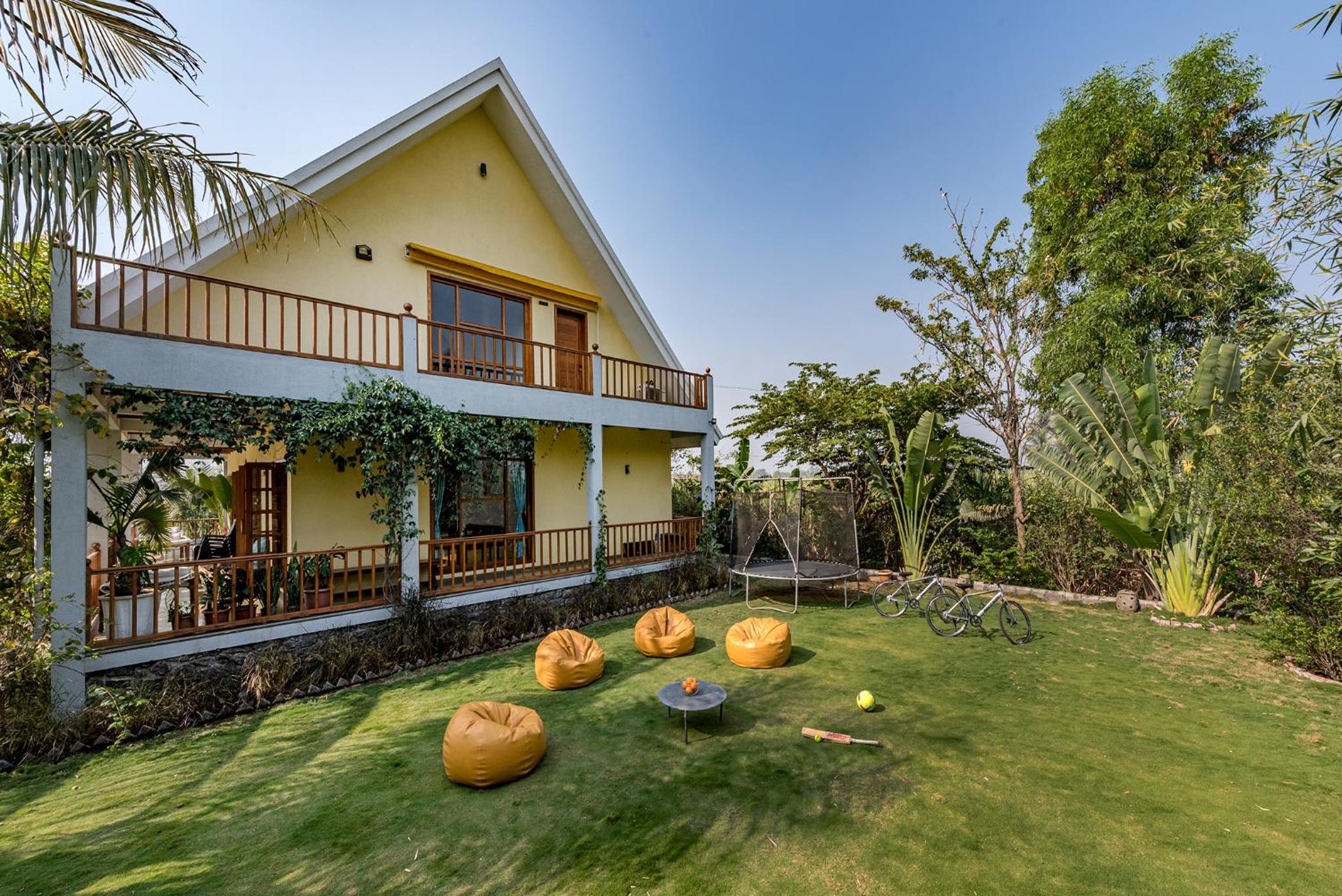 SaffronStays Happy Fields - Swimming pool farmhouse with farm views, hammocks & farm-to-table dining near Pune view 2