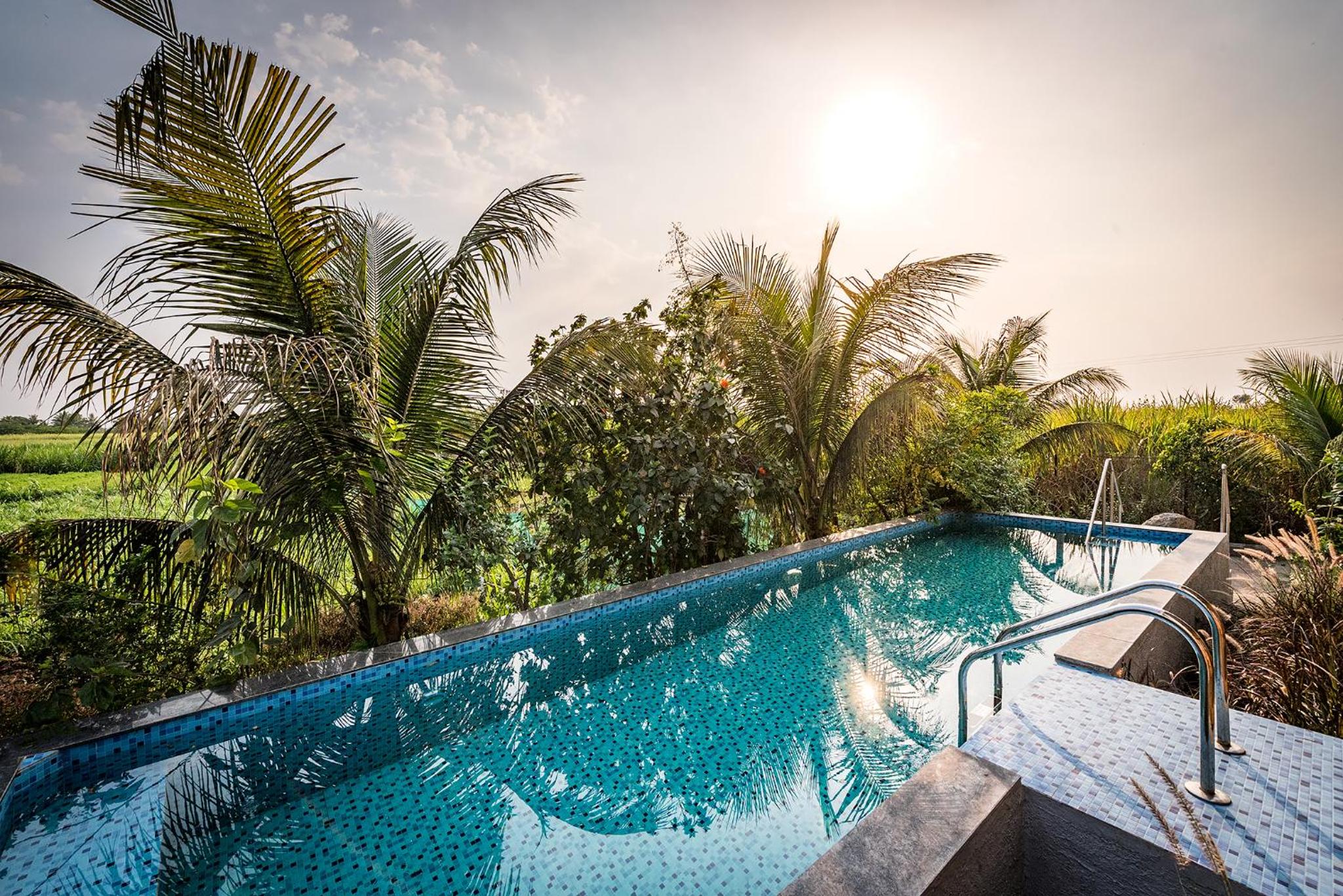 SaffronStays Happy Fields - Swimming pool farmhouse with farm views, hammocks & farm-to-table dining near Pune view 4
