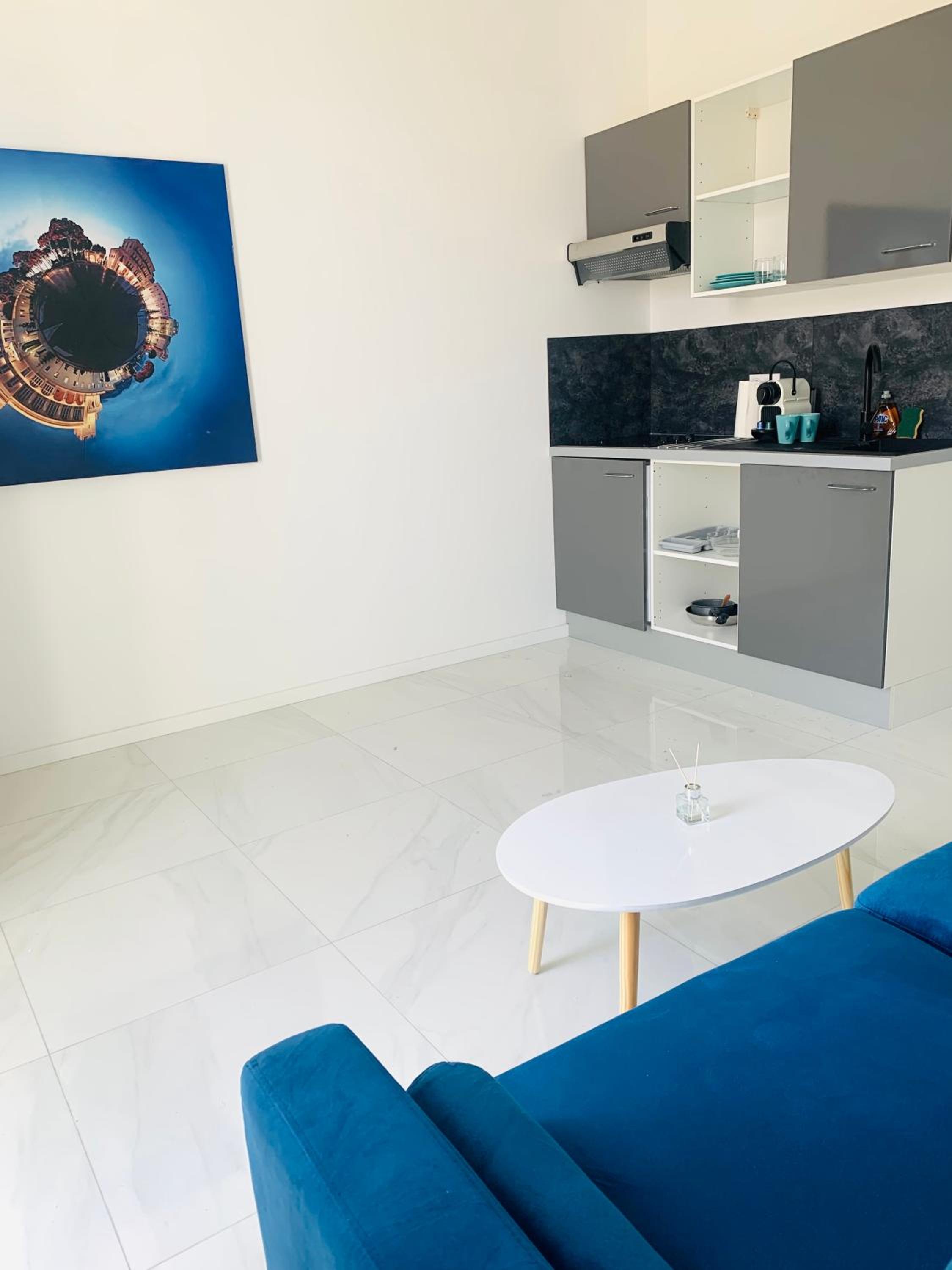 Rooftop Palette Retreat - Luxury 2BR with Patio view 3