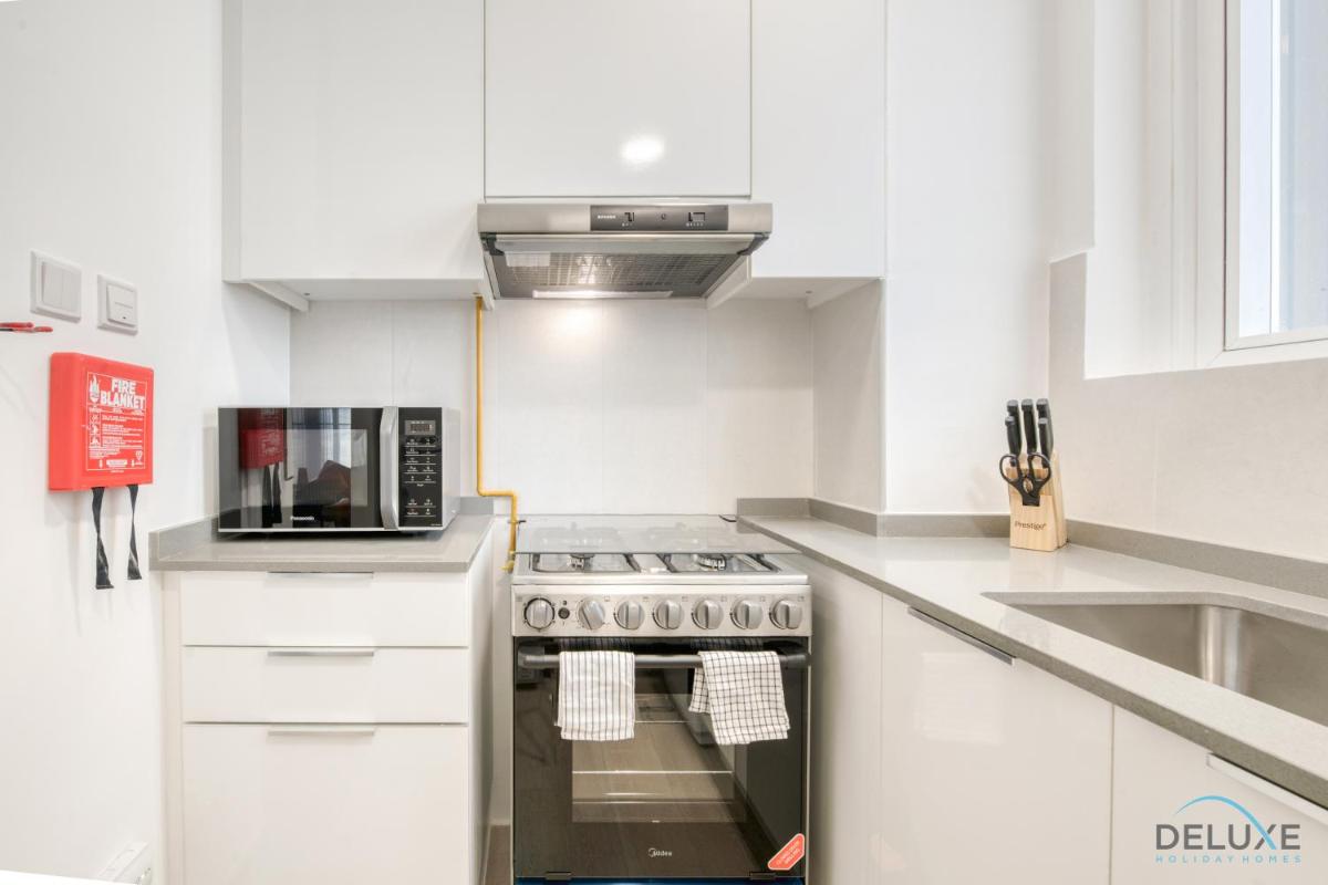 Cheerful 1BR at Bloom Tower B JVC By Deluxe Holiday Homes
