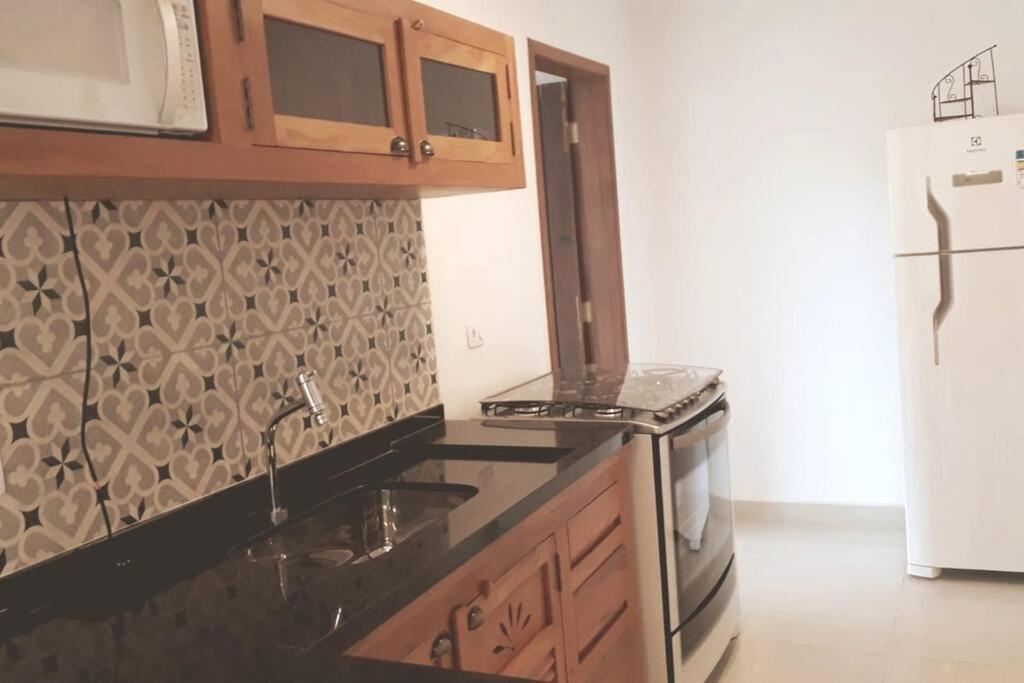 Casa com varanda, ar condicionado pet friendly