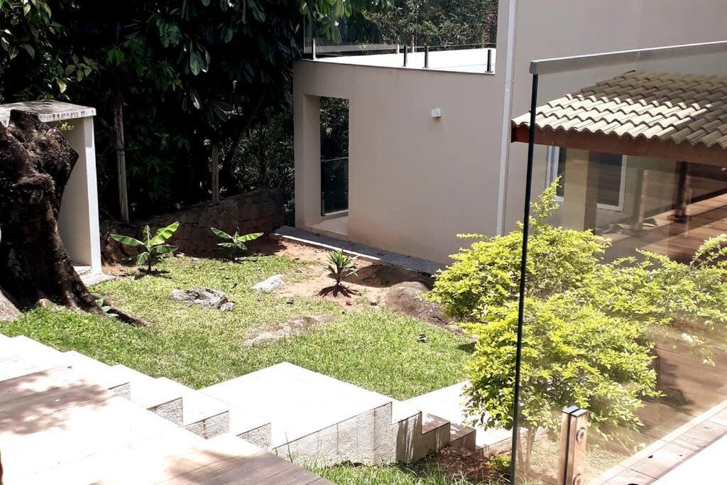 Casa com varanda, ar condicionado pet friendly