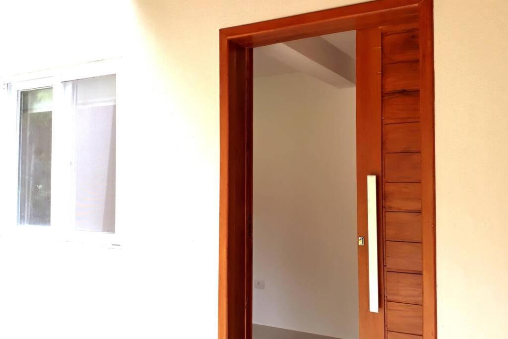 Casa com varanda, ar condicionado pet friendly