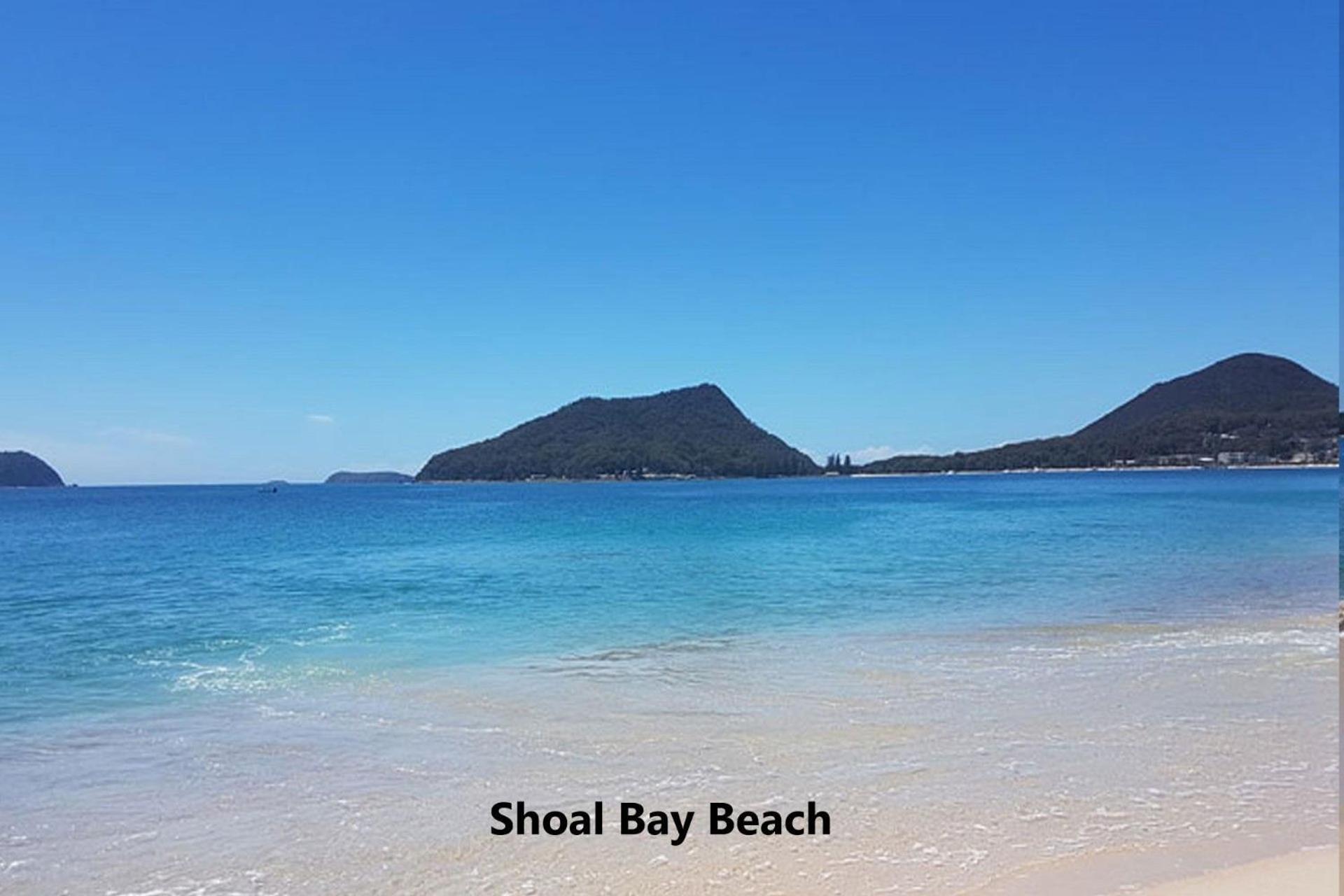 Shoal Towers 4 11 Shoal Bay Road straight across the road to the beach view 4