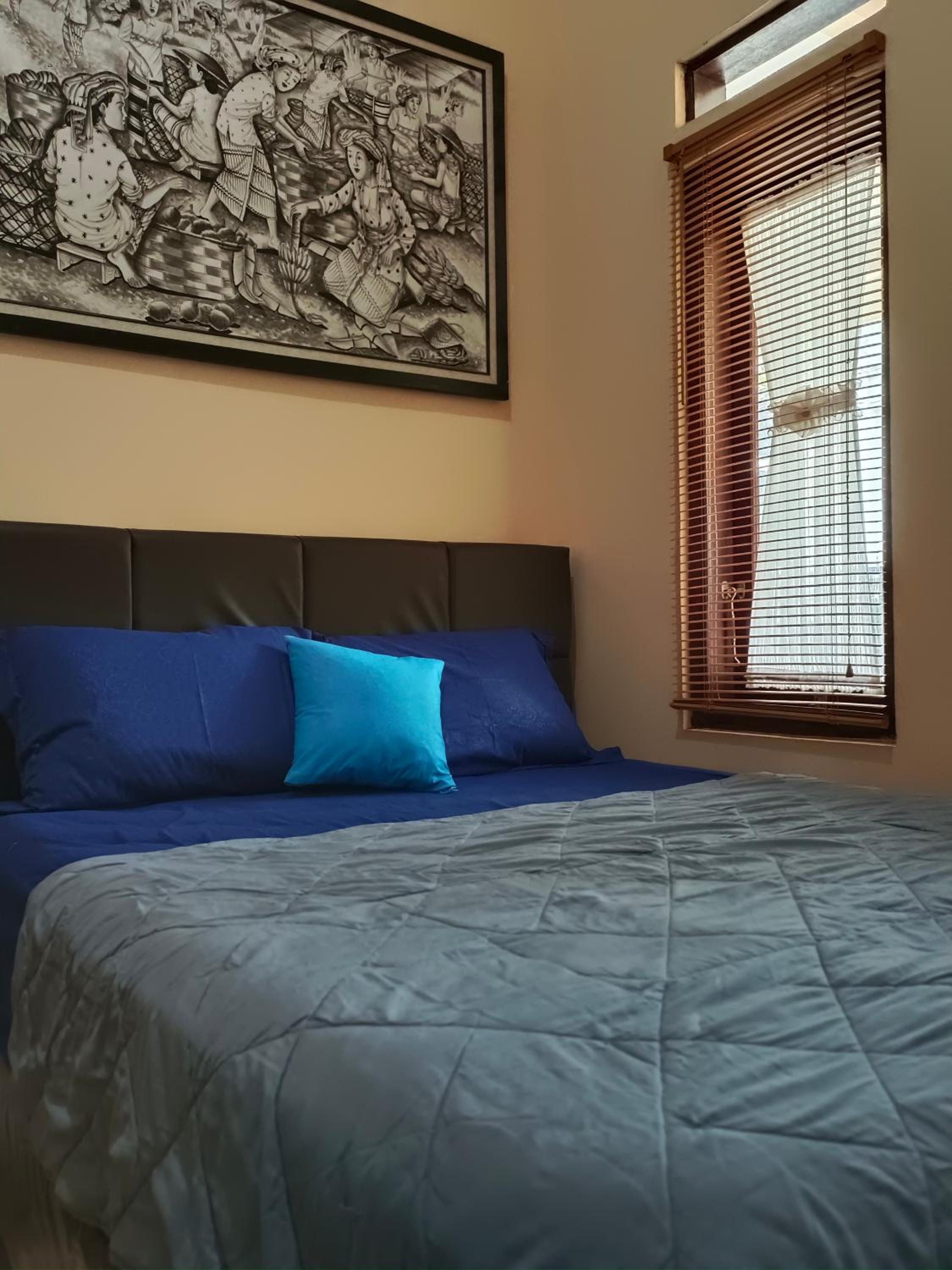 RR Family Homestay Syariah Batu - Property Image 11