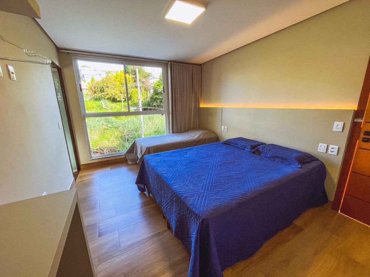 Casa Escarpas do Lago, 4 suítes e ar-condicionado