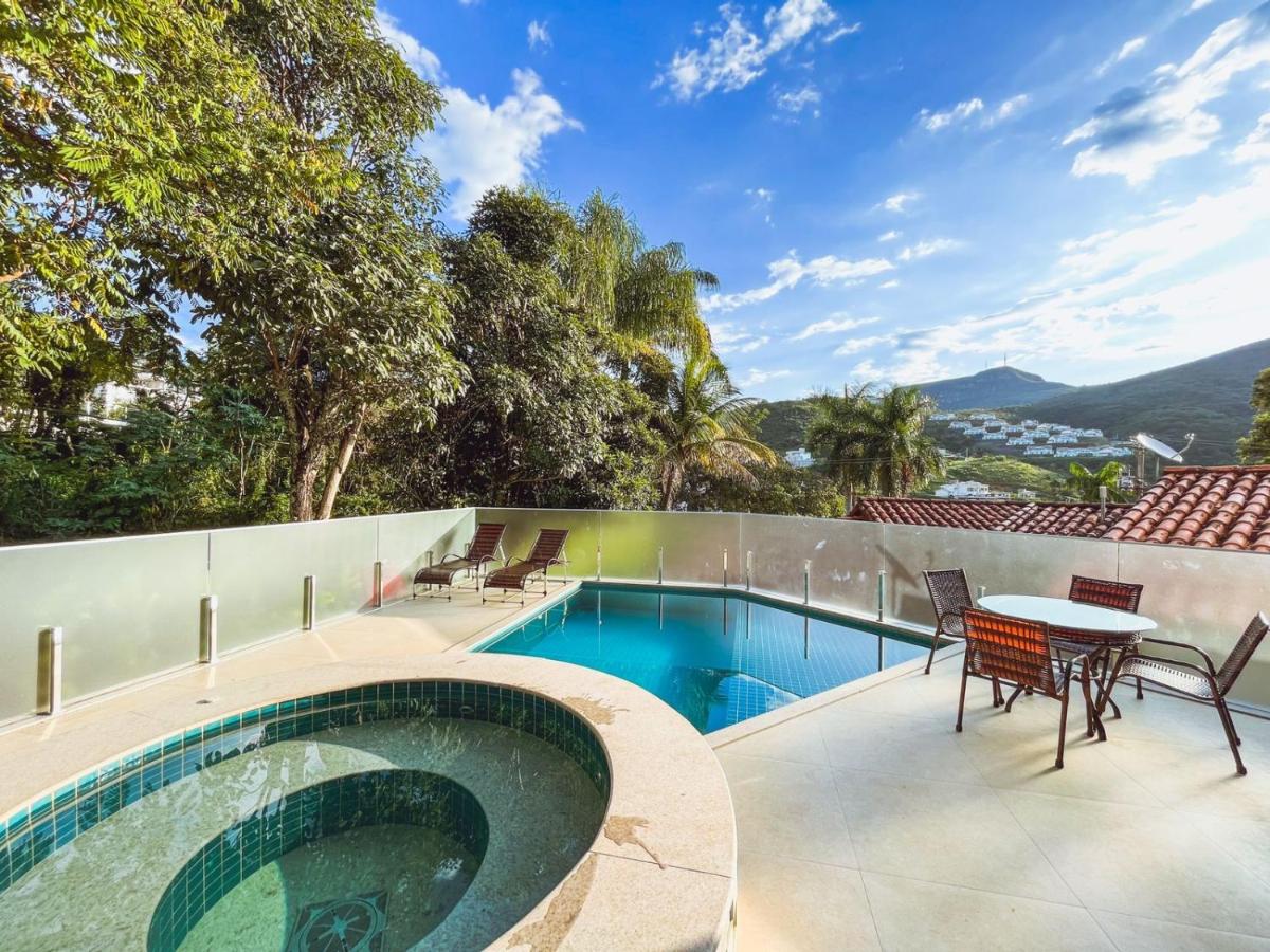 Casa Escarpas do Lago, 4 suítes e ar-condicionado