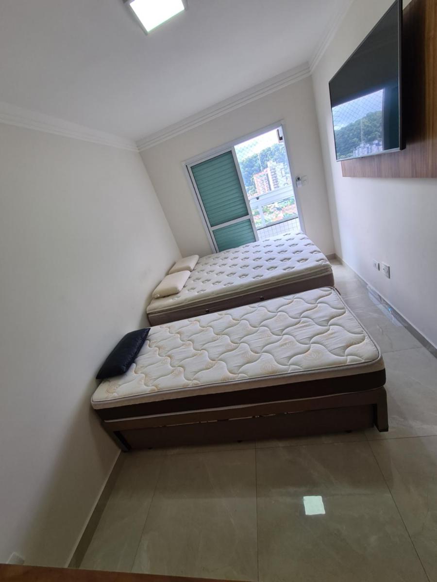 Apartamento na praia canto do forte view 2