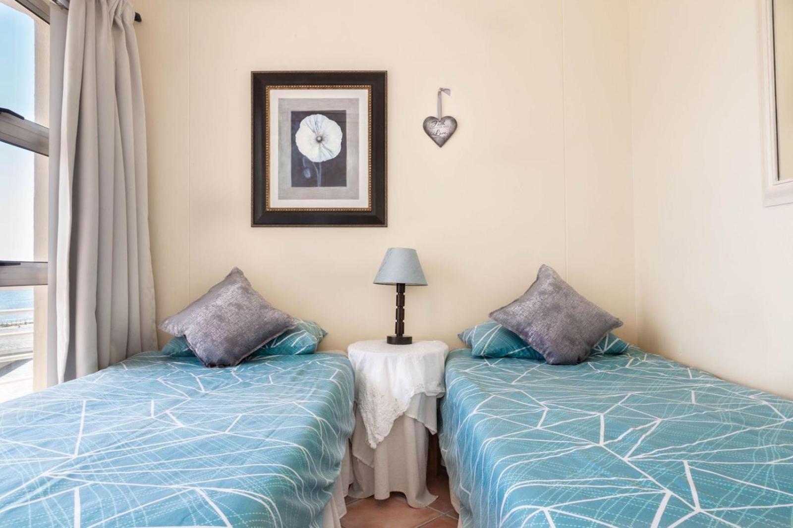 Luxury beachfront 2 bed, 2 bath with communal swimming pool