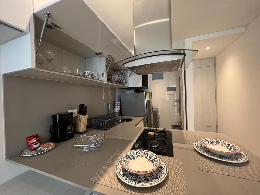 Distrito 90 - Estudios y Apartamentos para vacaciones y viajes de negocio