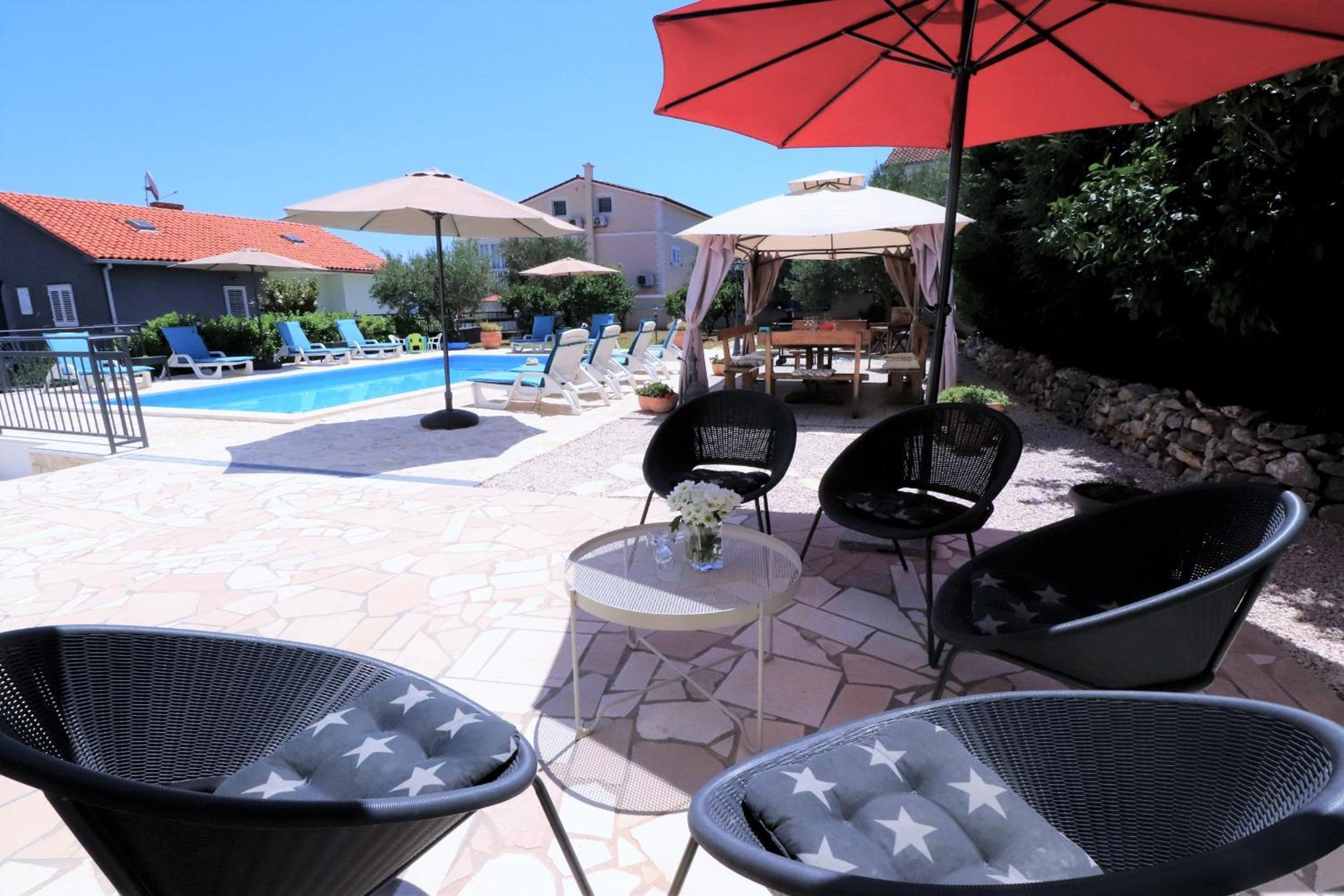 Villa Mendula Trogir - Luxury villa by the beach - heated pool - lush green garden view 2