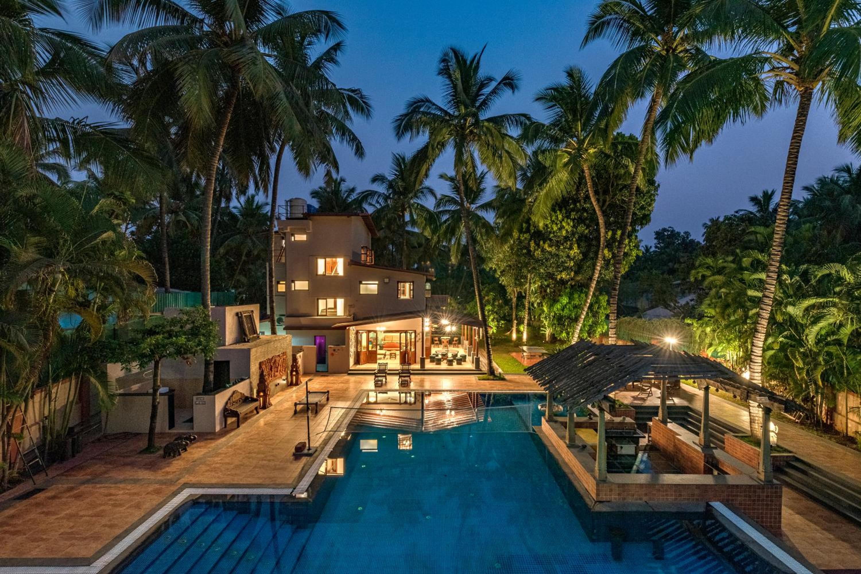 SaffronStays Casa Del Palms - 8BR luxury pool villa with gazebo, pickleball, bar & lawns near Nagaon Beach view 2