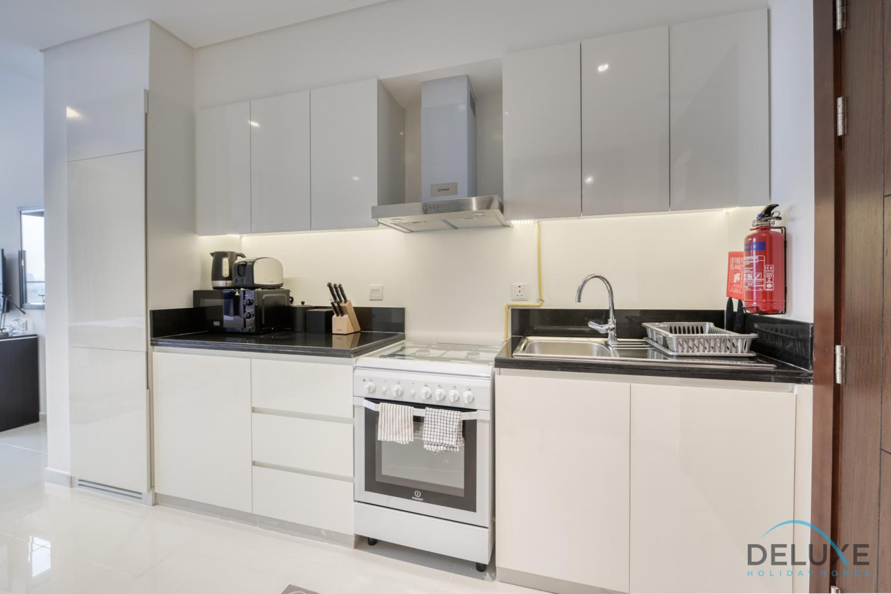 Sunlit Studio at Golf Promenade 2A DAMAC Hills By Deluxe Holiday Homes