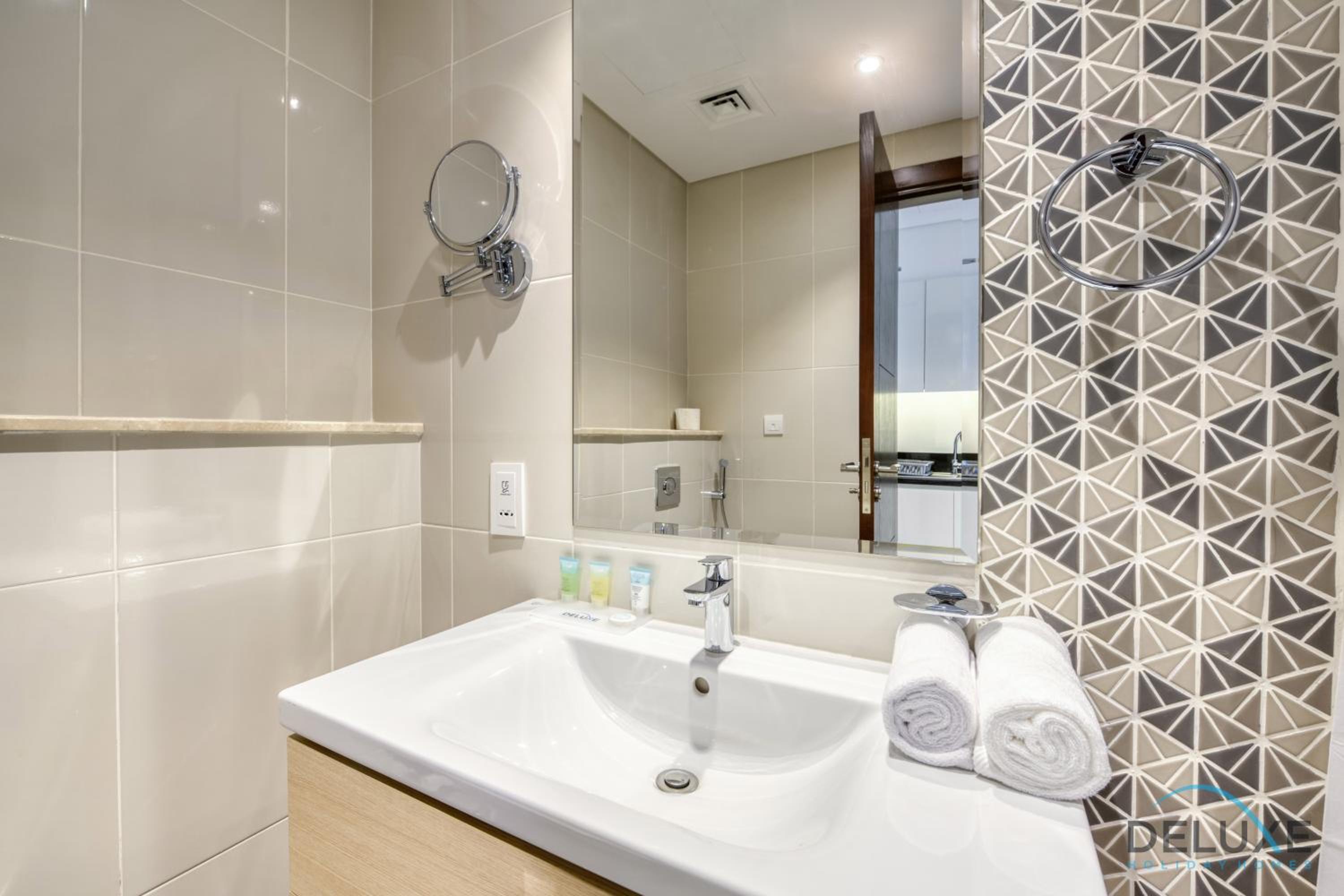 Sunlit Studio at Golf Promenade 2A DAMAC Hills By Deluxe Holiday Homes