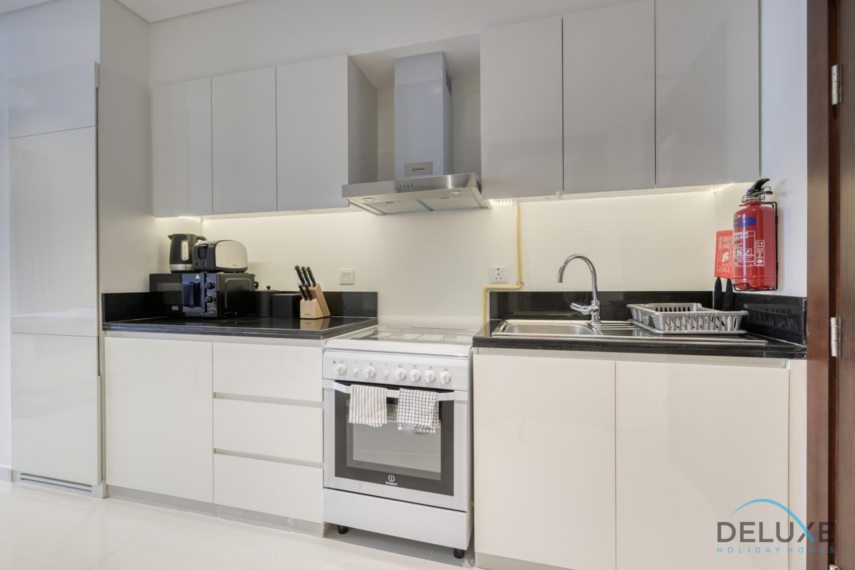 Sunlit Studio at Golf Promenade 2A DAMAC Hills By Deluxe Holiday Homes