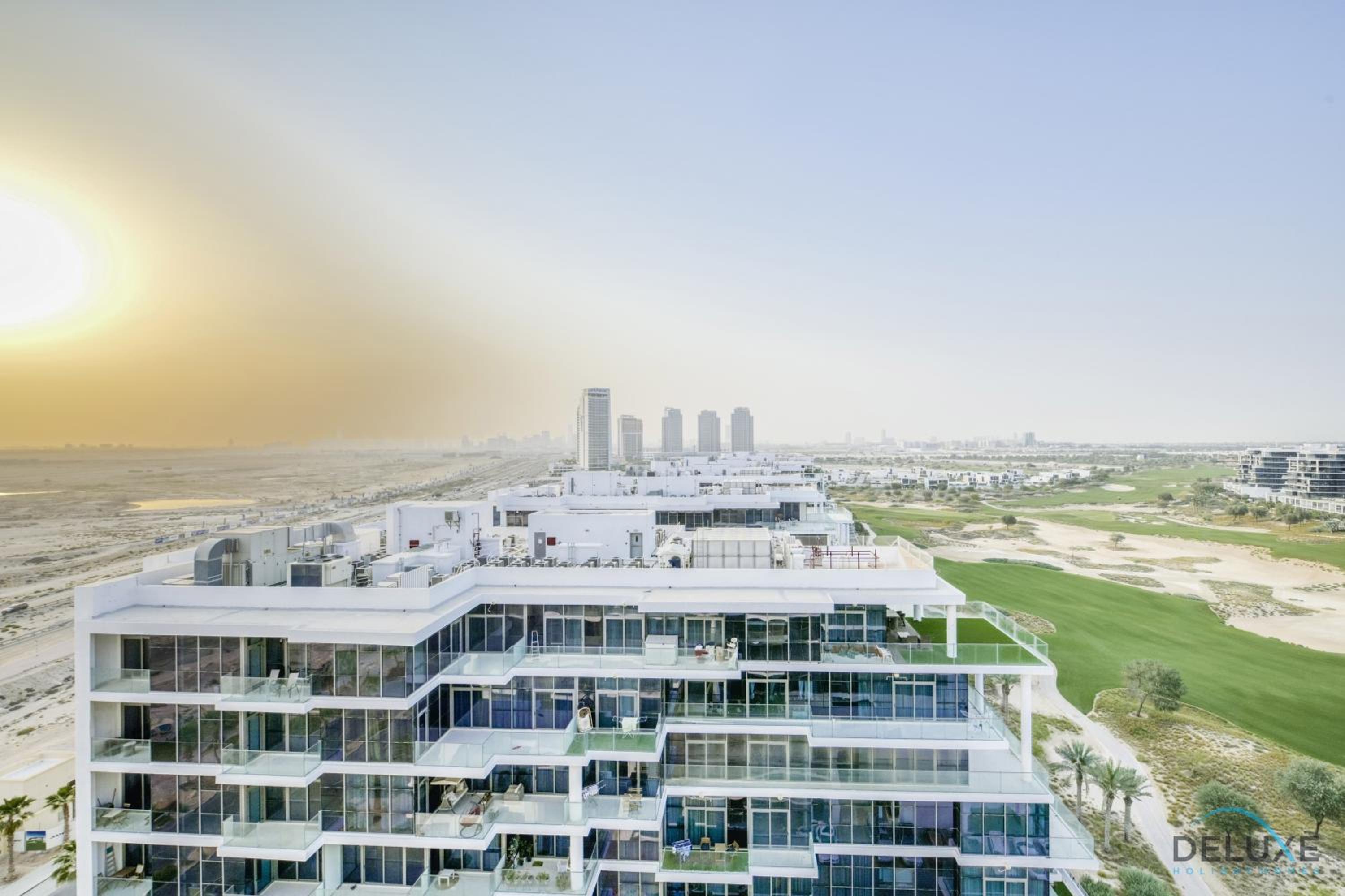 Sunlit Studio at Golf Promenade 2A DAMAC Hills By Deluxe Holiday Homes
