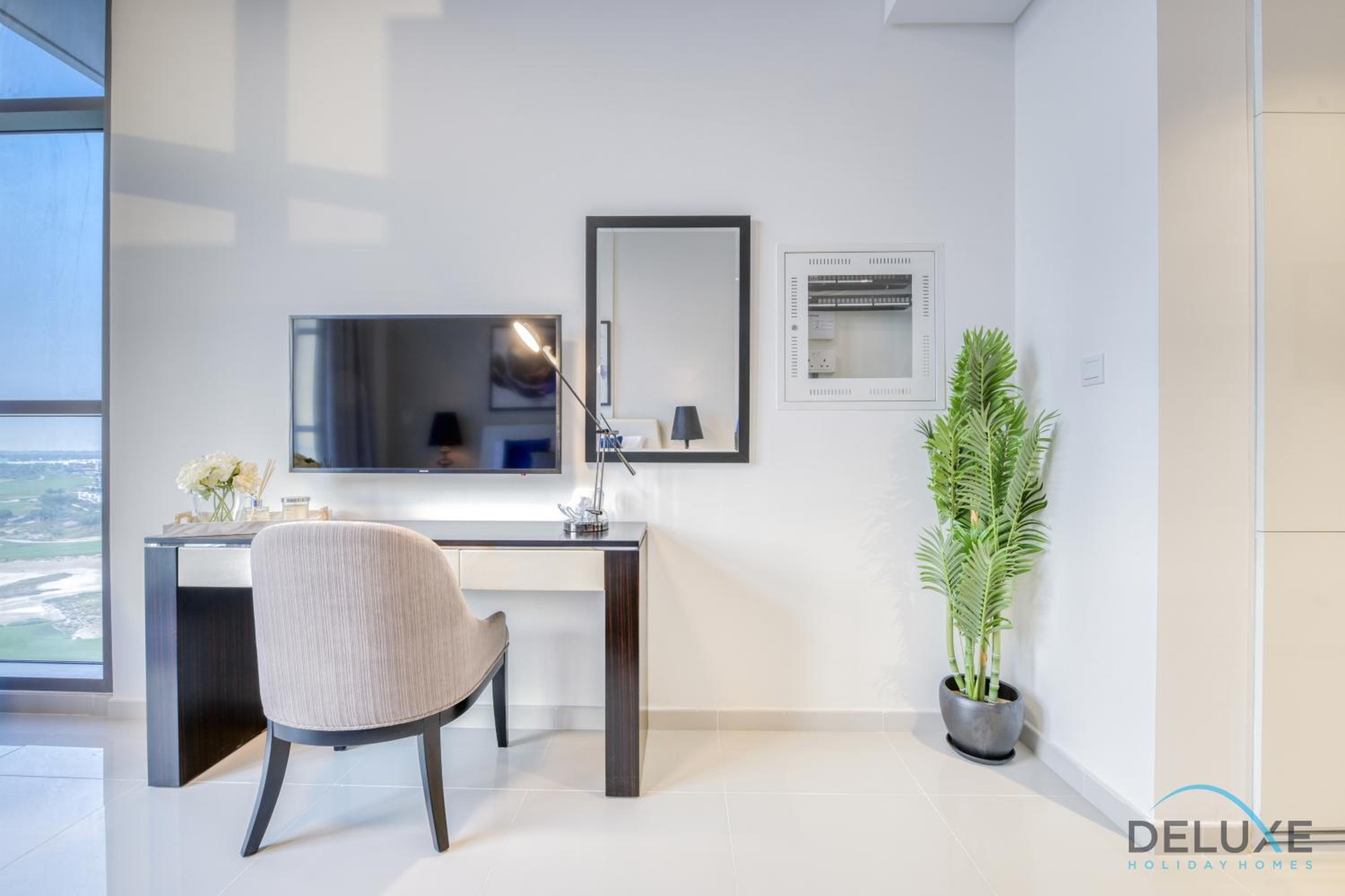 Sunlit Studio at Golf Promenade 2A DAMAC Hills By Deluxe Holiday Homes