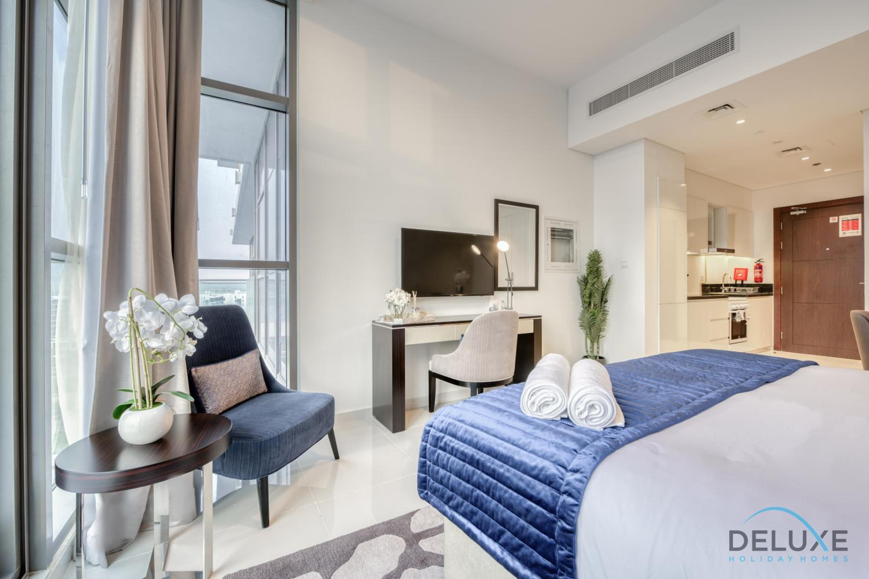 Sunlit Studio at Golf Promenade 2A DAMAC Hills By Deluxe Holiday Homes