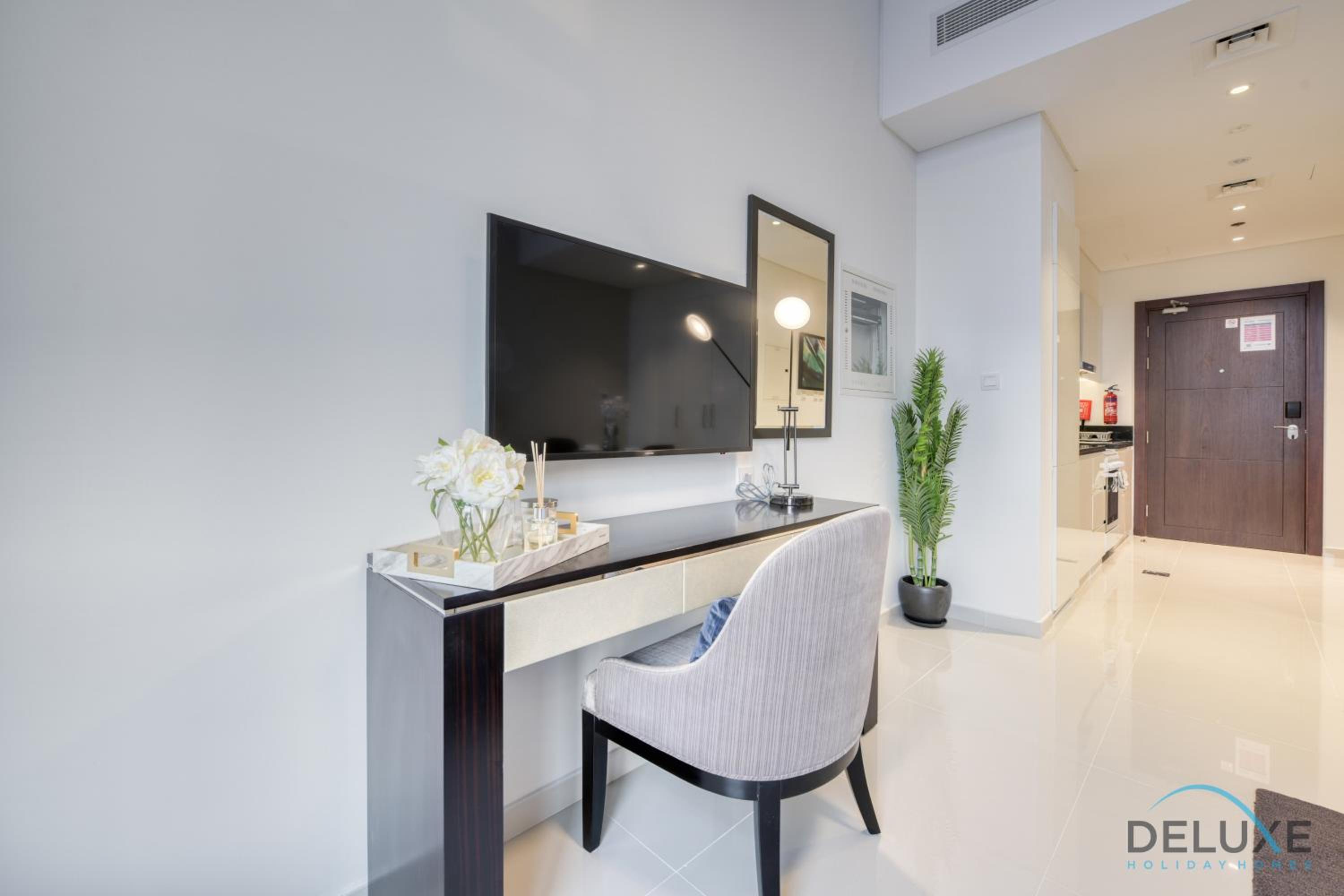 Sunlit Studio at Golf Promenade 2A DAMAC Hills By Deluxe Holiday Homes