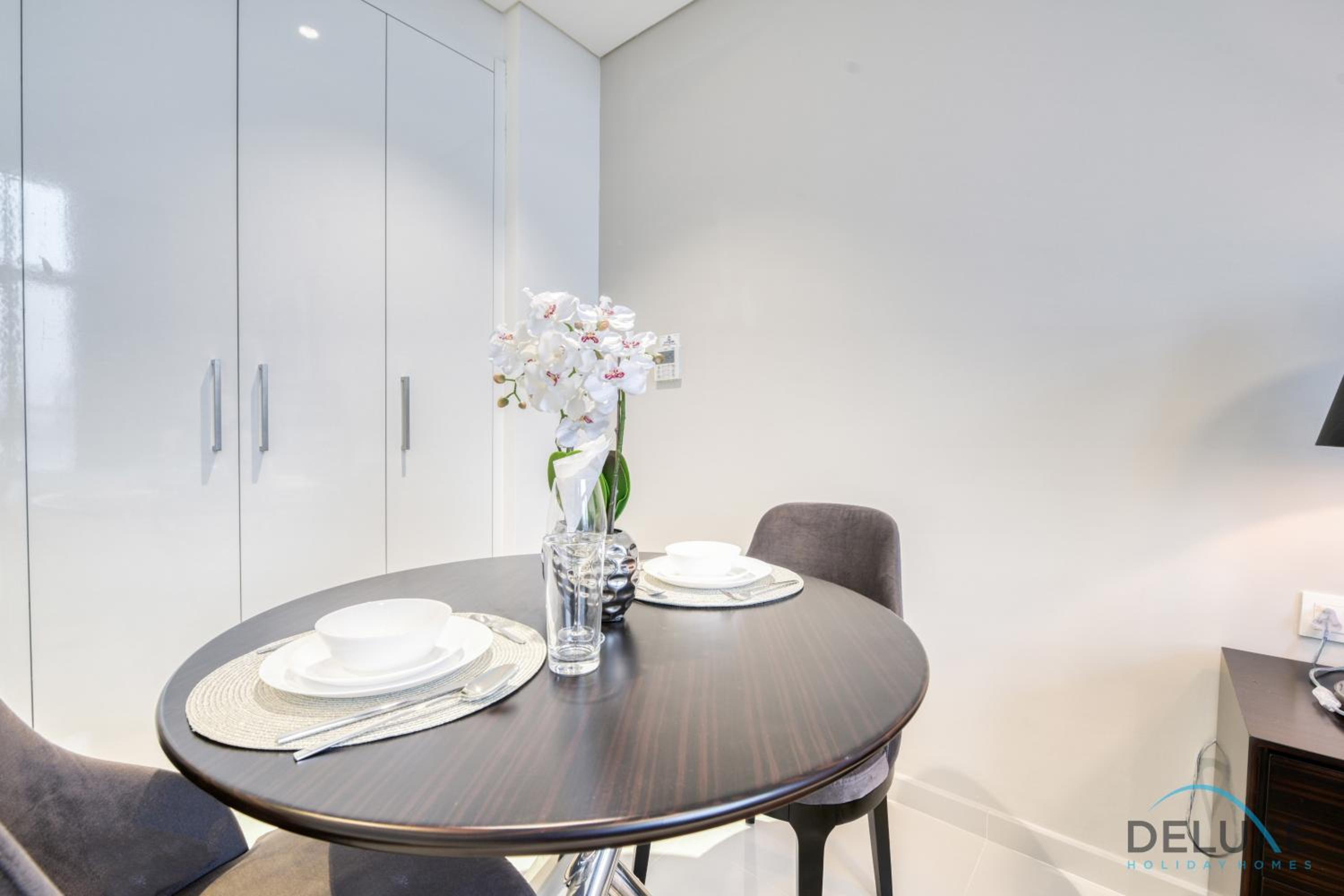 Sunlit Studio at Golf Promenade 2A DAMAC Hills By Deluxe Holiday Homes