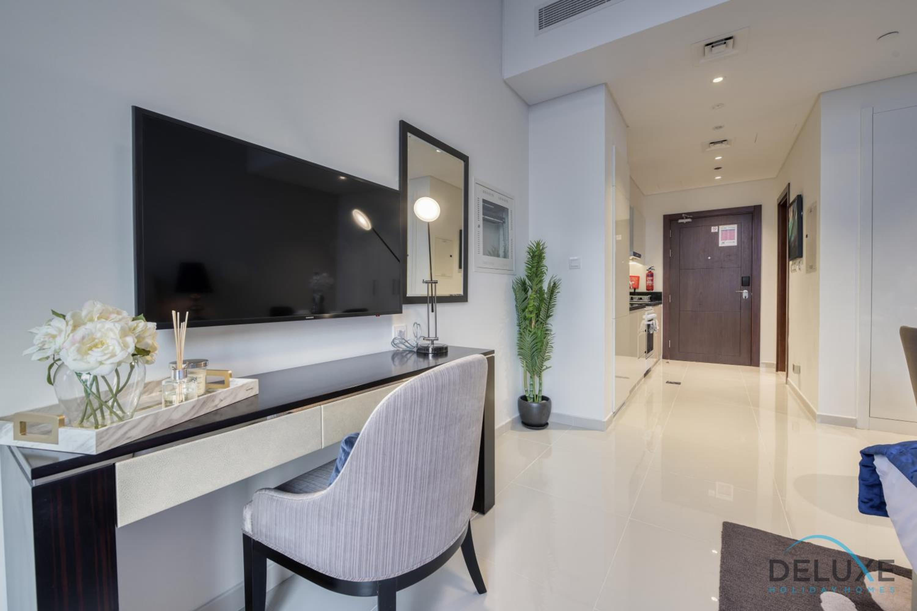 Sunlit Studio at Golf Promenade 2A DAMAC Hills By Deluxe Holiday Homes