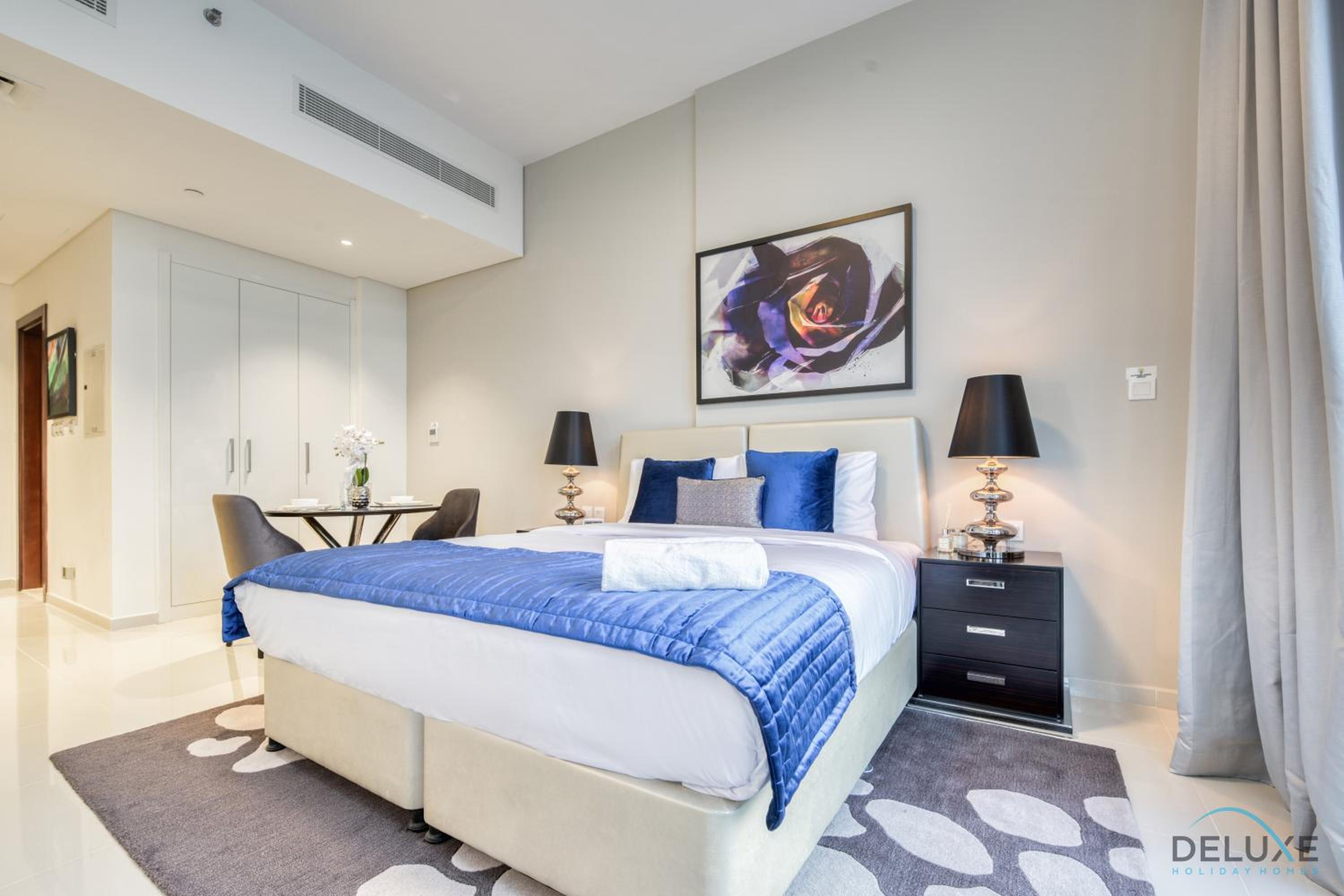 Sunlit Studio at Golf Promenade 2A DAMAC Hills By Deluxe Holiday Homes