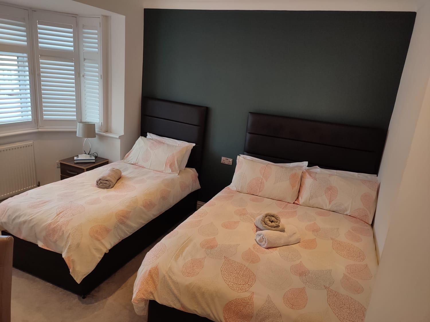 Apple House Wembley - Family room with shared bathroom view 2
