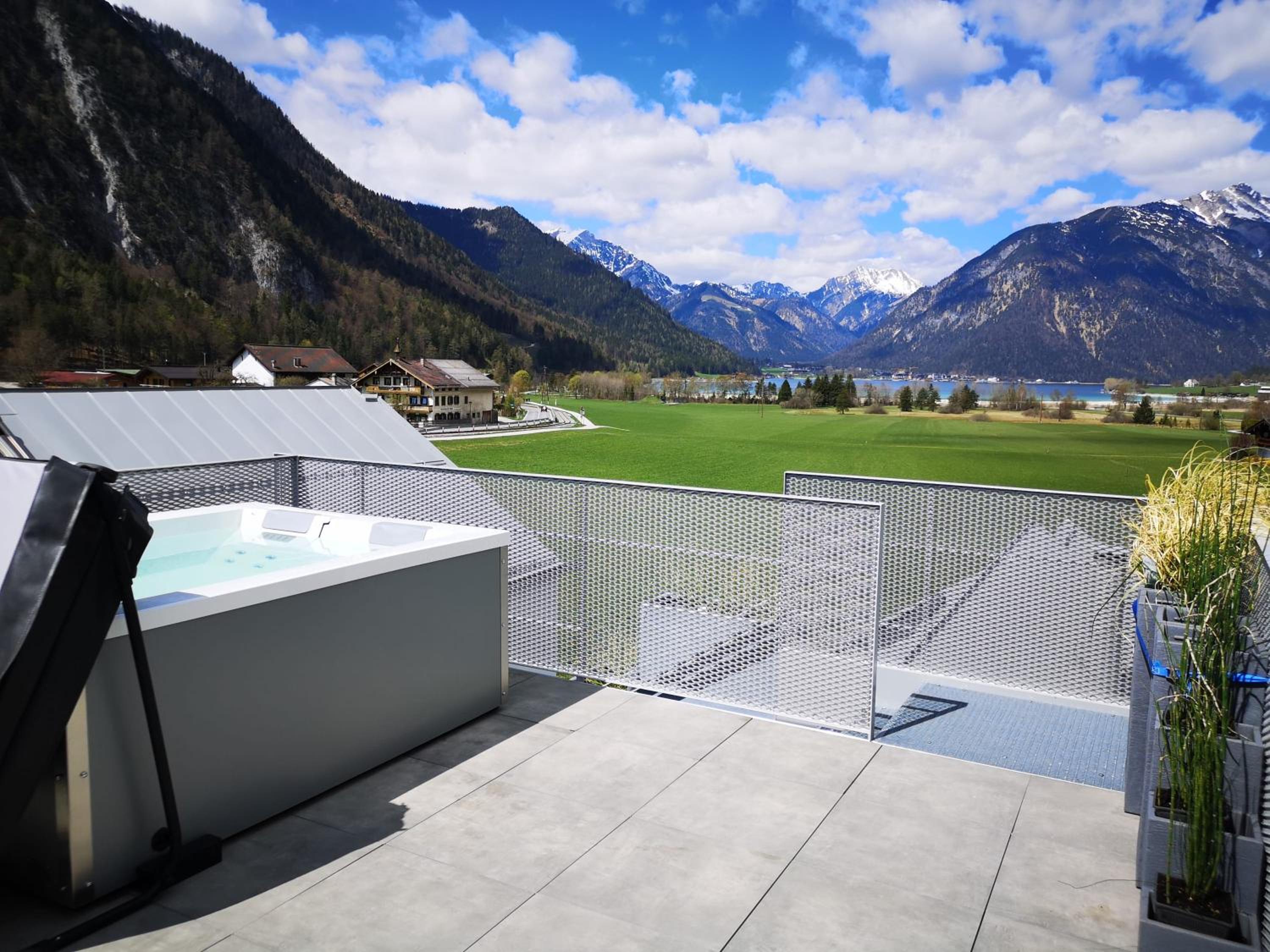 Modern Alpine Penthouse with Lake View