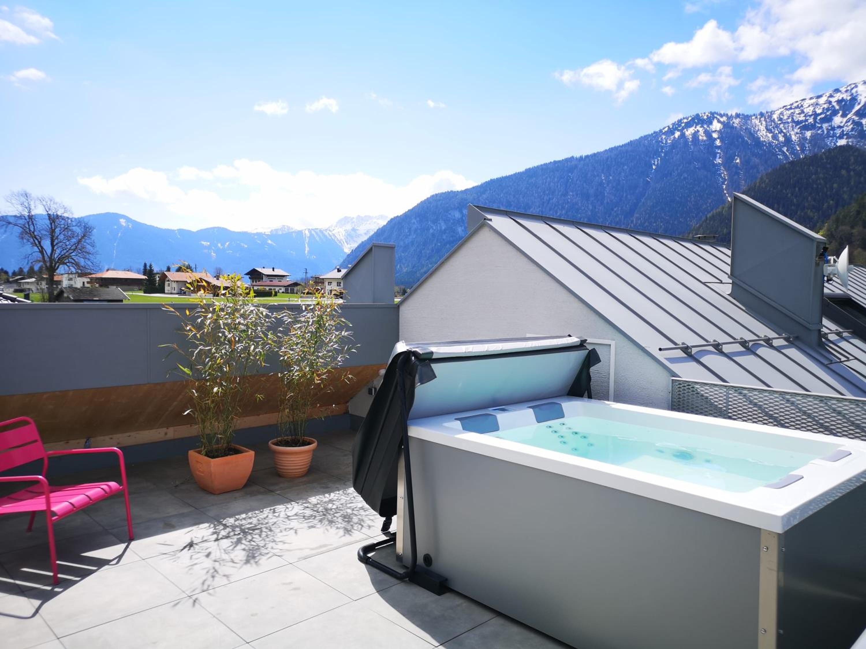 Modern Alpine Penthouse with Lake View