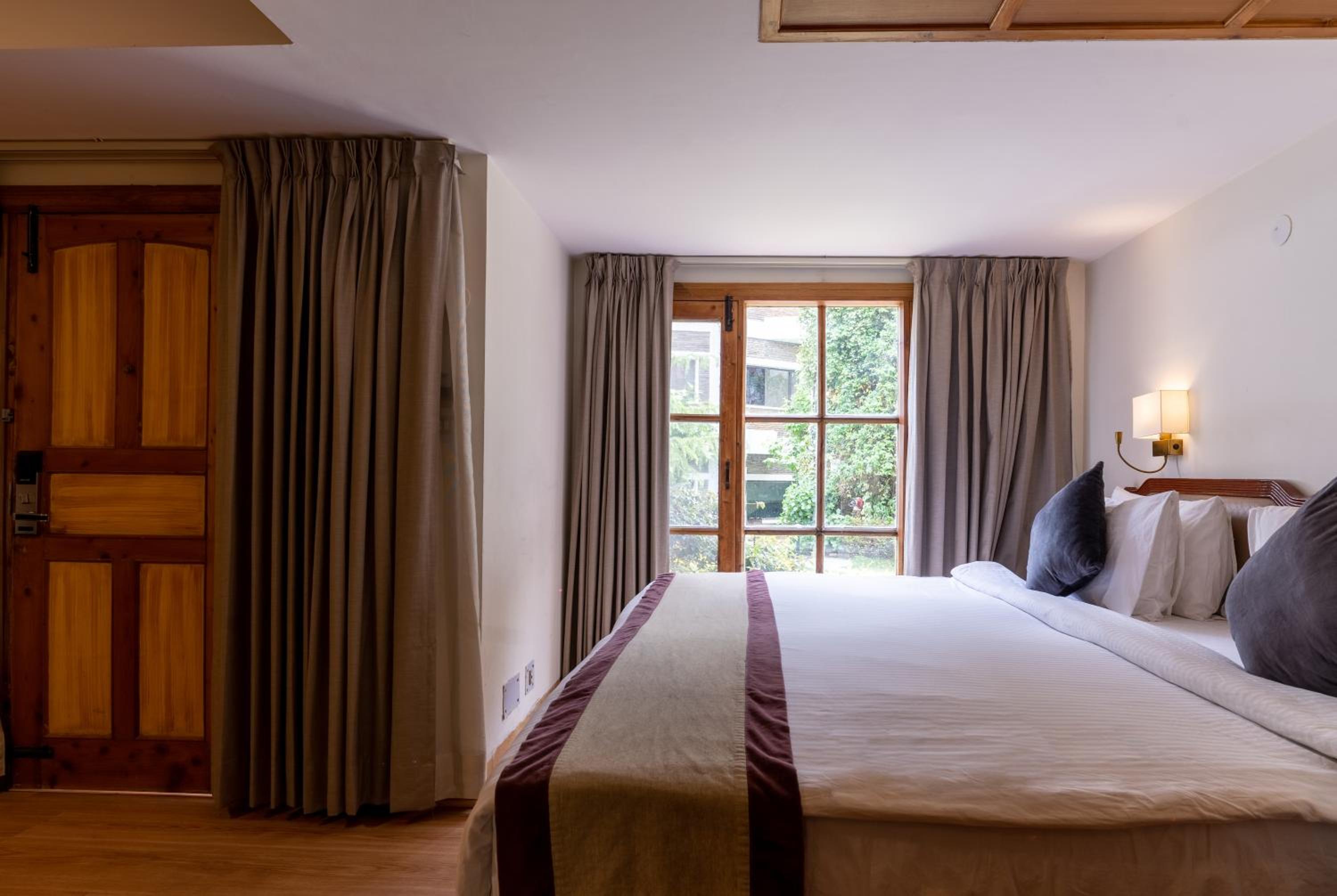 Marigold Sarovar Portico Shimla with Heated pool and AC Rooms-A Resort cottage and SPA Marigold Sarovar Portico Shimla with Heated pool and AC Rooms-A Resort cottage and SPA