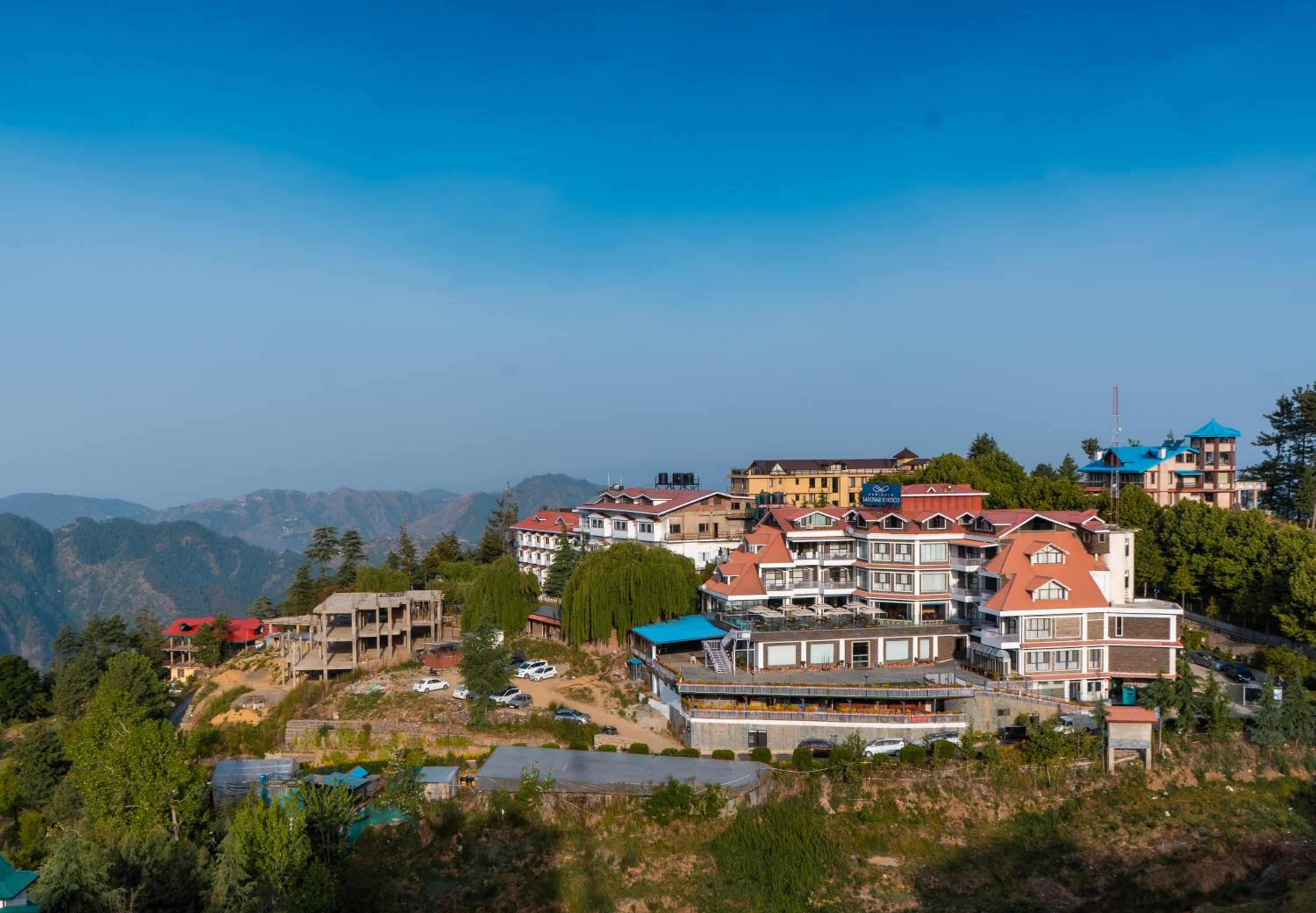 Marigold Sarovar Portico Shimla with Heated pool and AC Rooms-A Resort cottage and SPA Marigold Sarovar Portico Shimla with Heated pool and AC Rooms-A Resort cottage and SPA