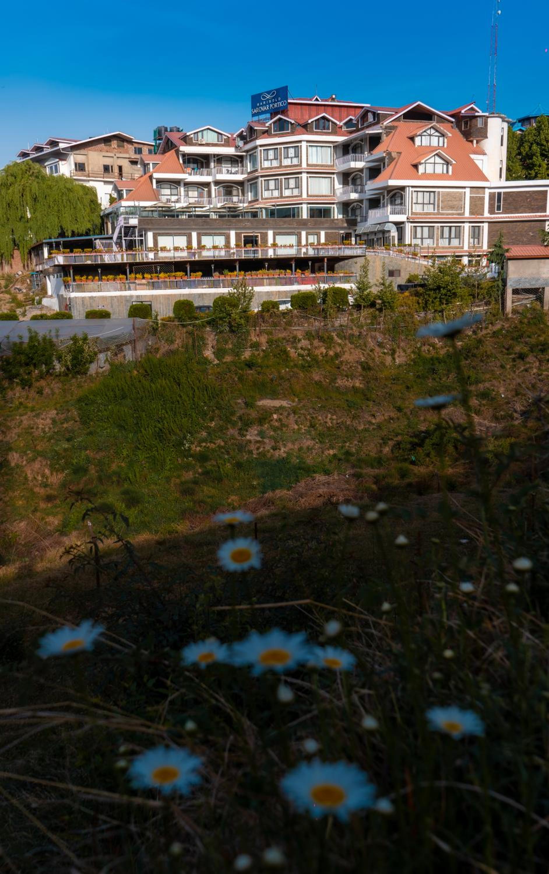Marigold Sarovar Portico Shimla with Heated pool and AC Rooms-A Resort cottage and SPA Marigold Sarovar Portico Shimla with Heated pool and AC Rooms-A Resort cottage and SPA