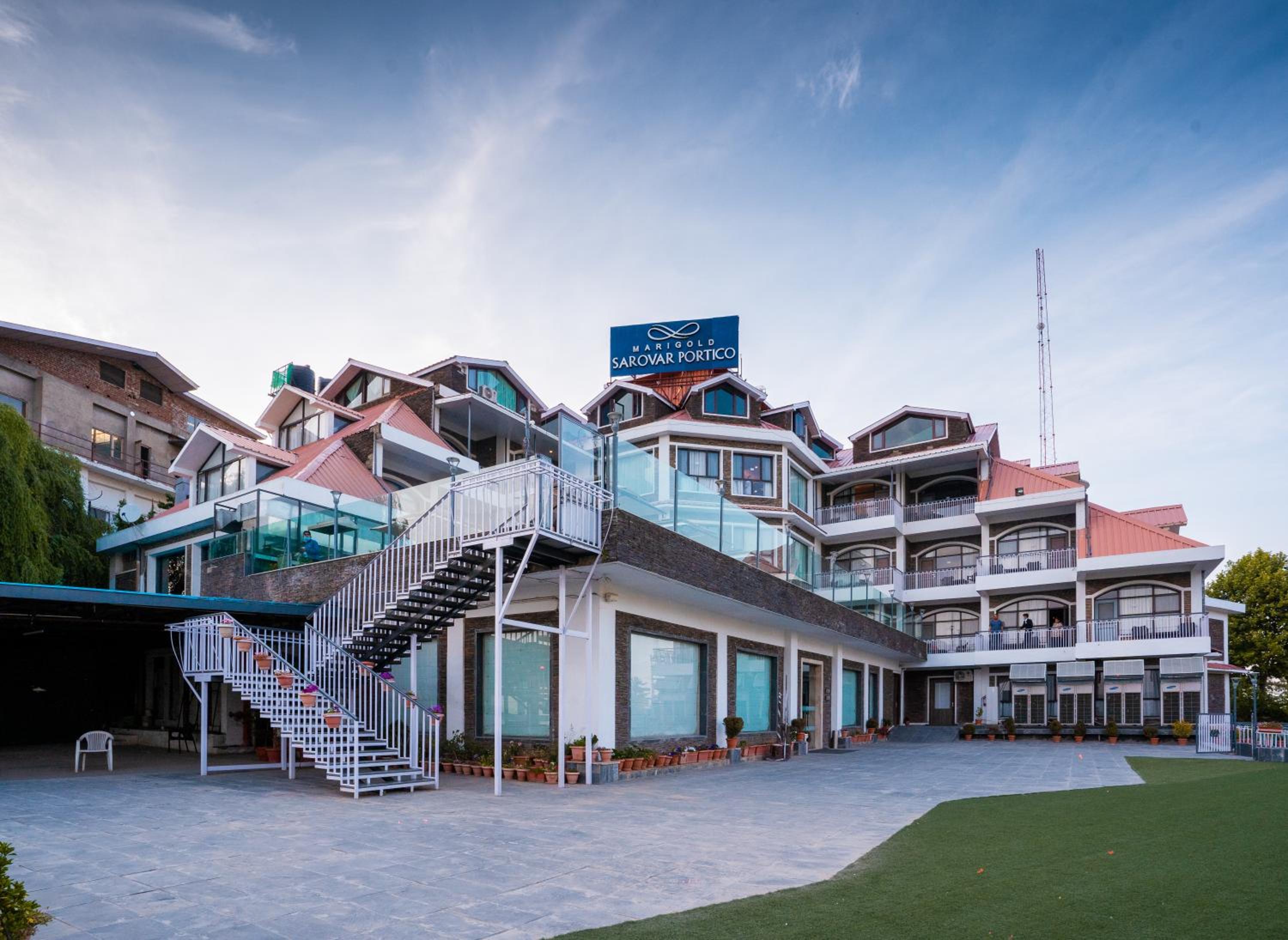 Marigold Sarovar Portico Shimla with Heated pool and AC Rooms-A Resort cottage and SPA Marigold Sarovar Portico Shimla with Heated pool and AC Rooms-A Resort cottage and SPA