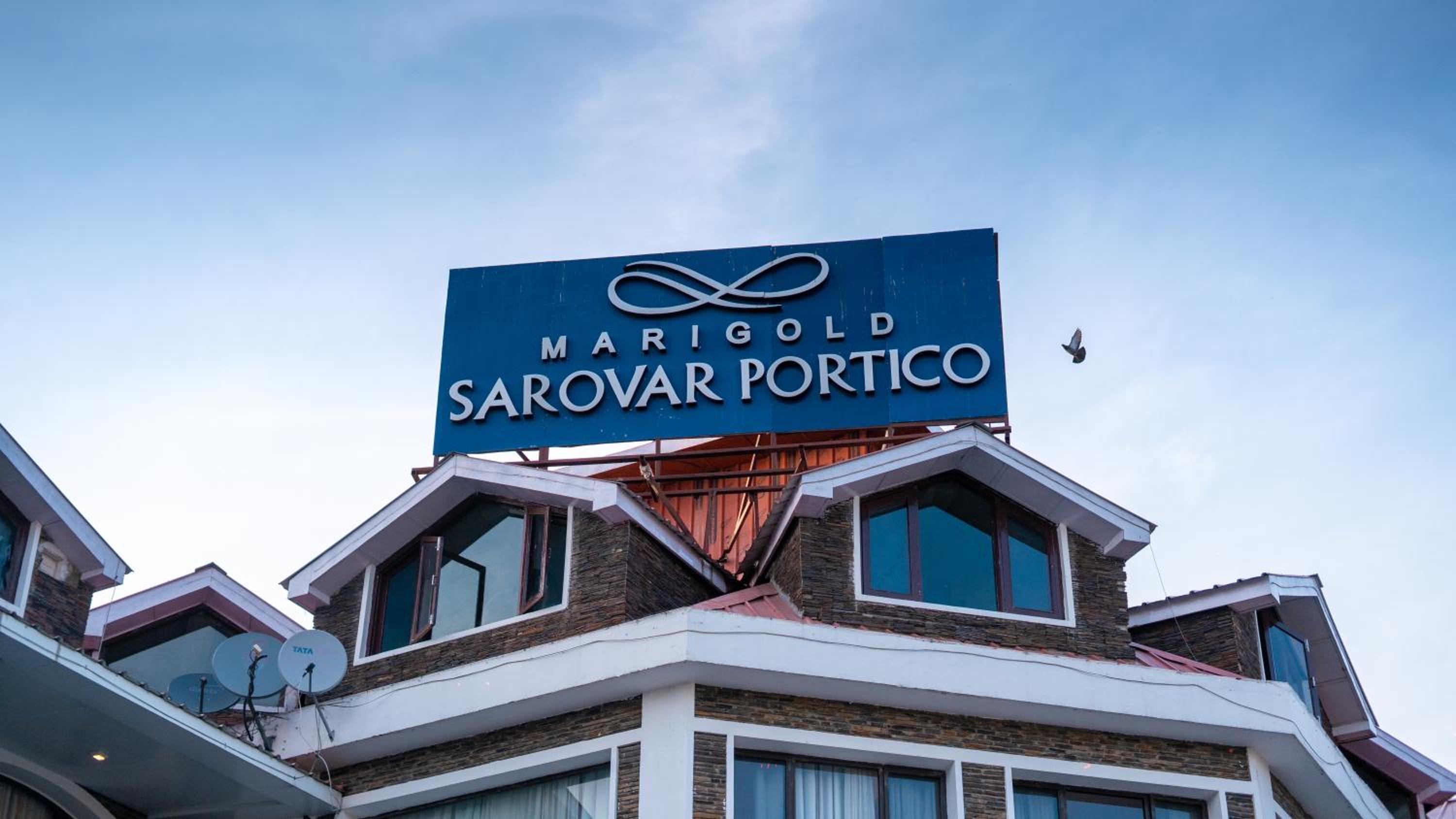 Marigold Sarovar Portico Shimla with Heated pool and AC Rooms-A Resort cottage and SPA Marigold Sarovar Portico Shimla with Heated pool and AC Rooms-A Resort cottage and SPA