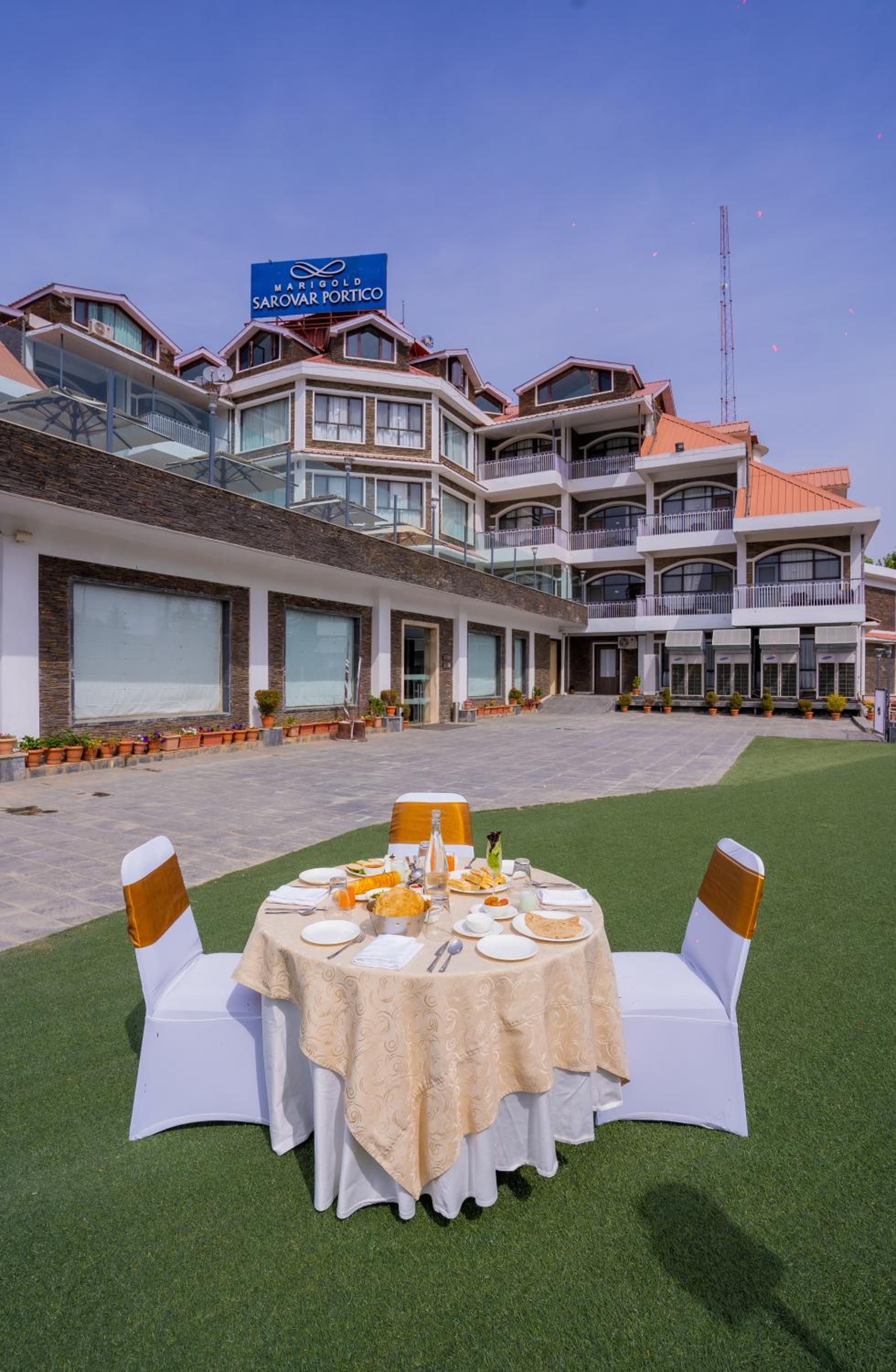 Marigold Sarovar Portico Shimla with Heated pool and AC Rooms-A Resort cottage and SPA Marigold Sarovar Portico Shimla with Heated pool and AC Rooms-A Resort cottage and SPA