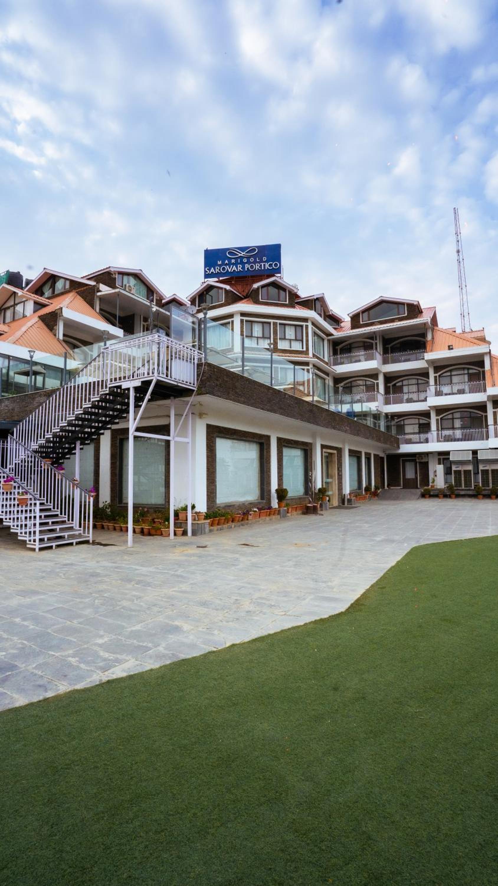 Marigold Sarovar Portico Shimla with Heated pool and AC Rooms-A Resort cottage and SPA Marigold Sarovar Portico Shimla with Heated pool and AC Rooms-A Resort cottage and SPA